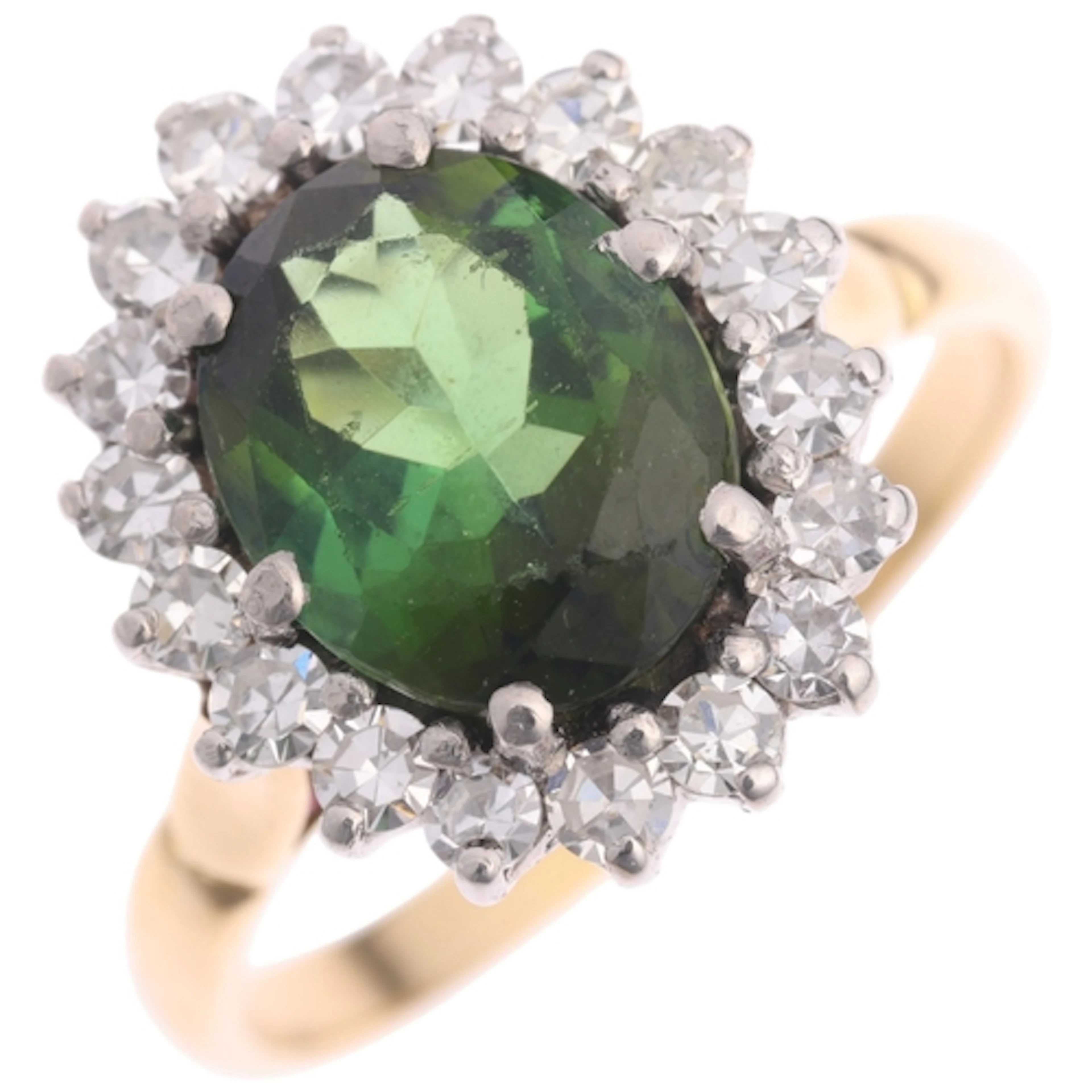 An 18ct gold green tourmaline and diamond cluster ring, claw...