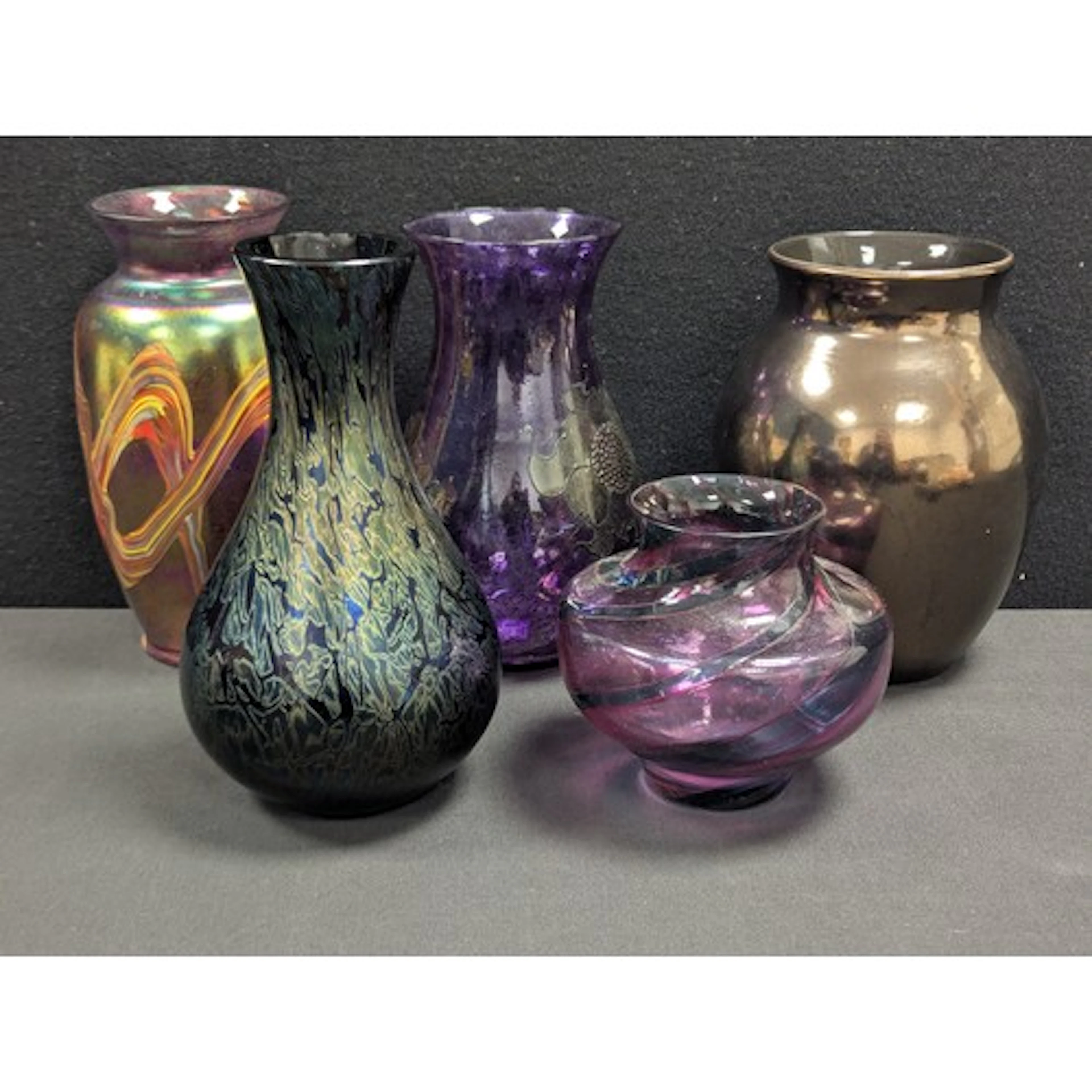 A Royal Brierley glass vase, decorated in iridescent tones o...