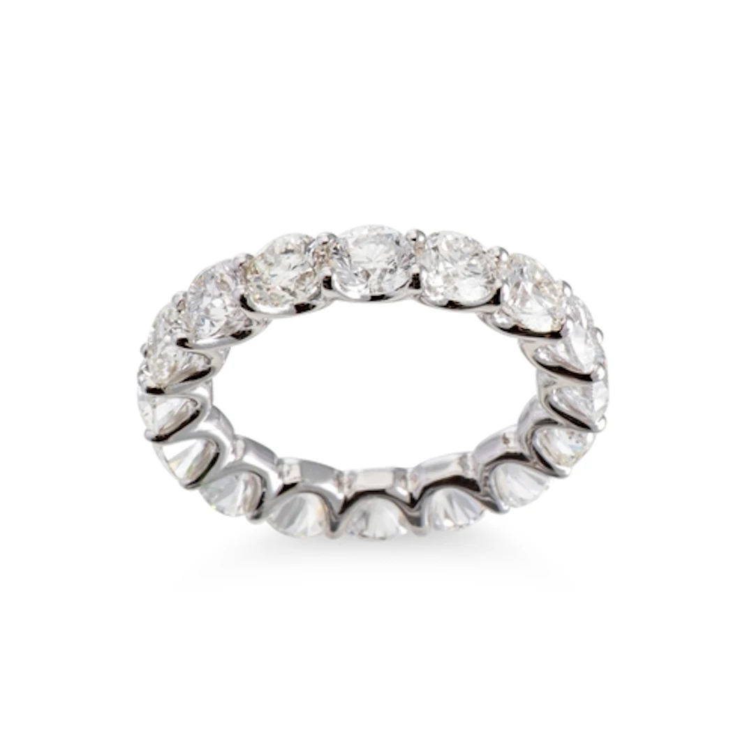 A DIAMOND FULL BANDED ETERNITY RING, the round brilliant cut...
