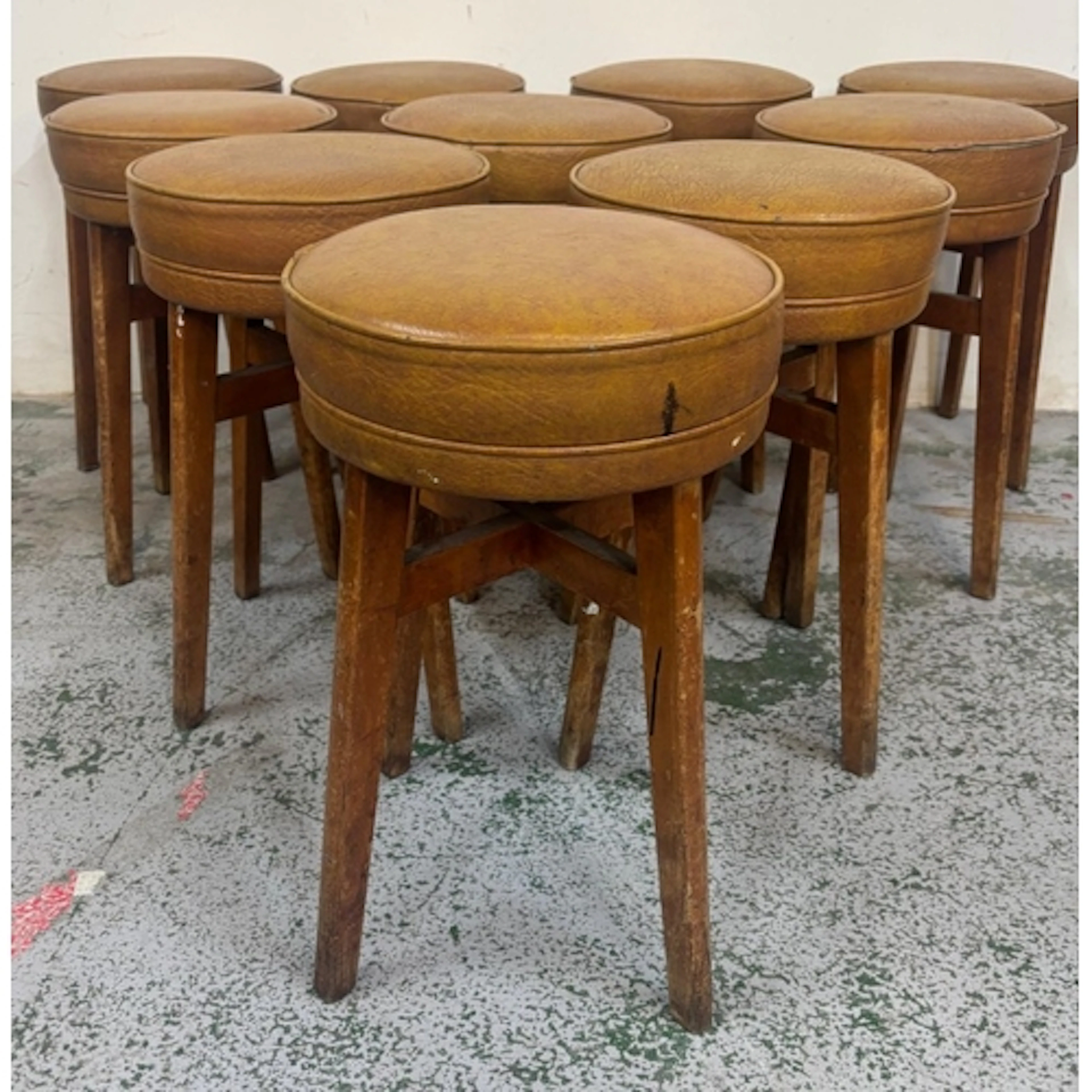 Ten vintage-style stools by Benchairs featuring circular vin...