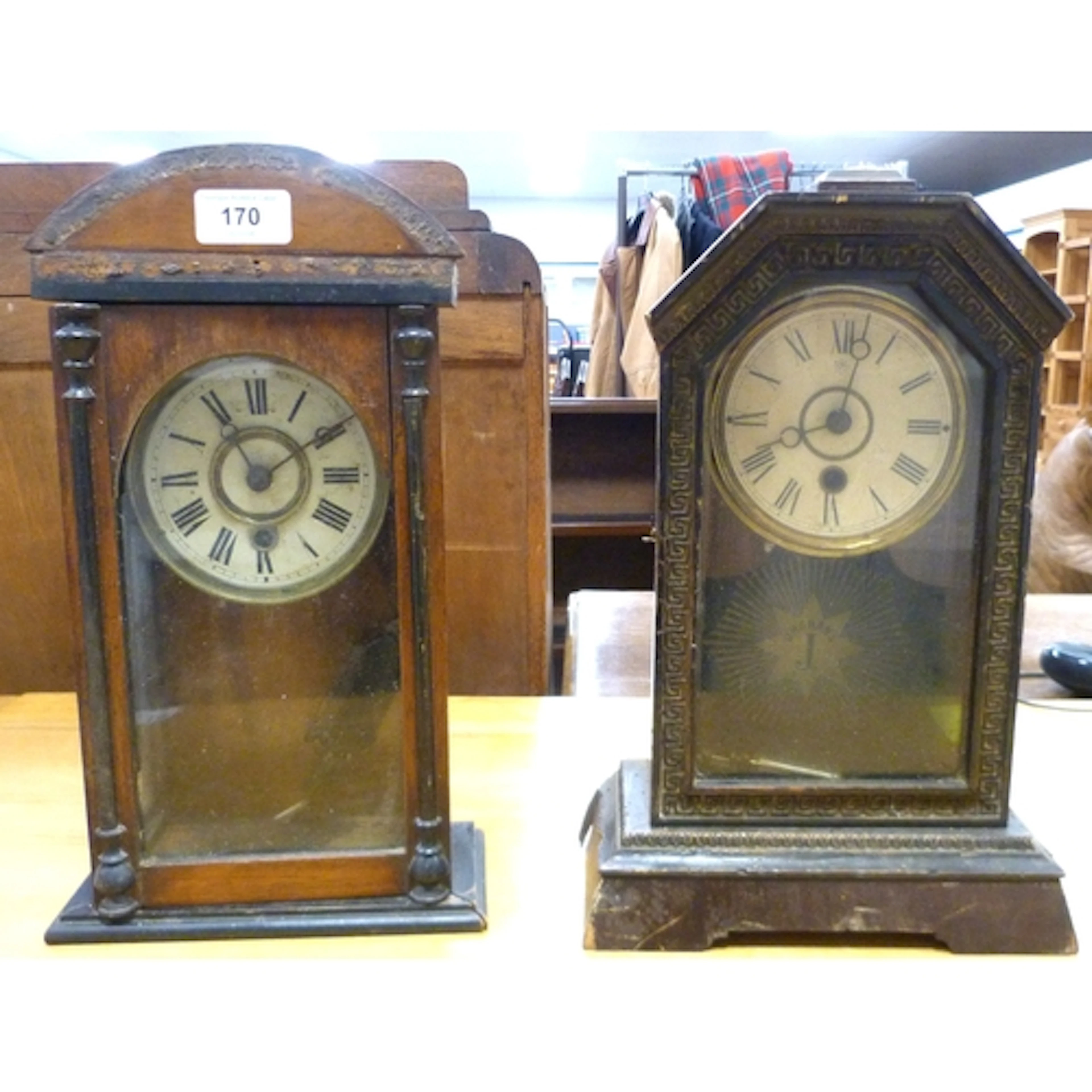 Two antique mantel clocks.