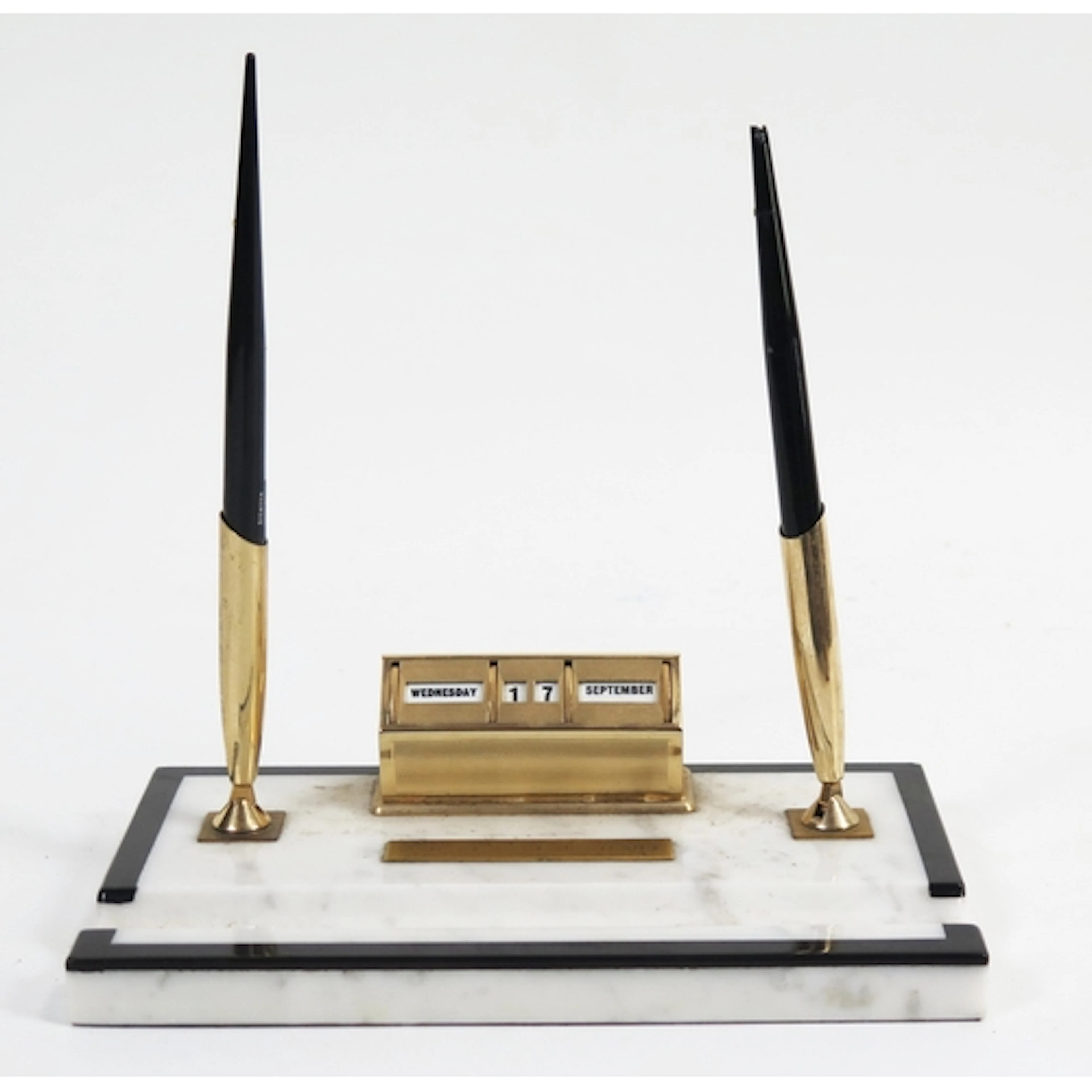 A polished marble desk stand, made from the marble floor of ...