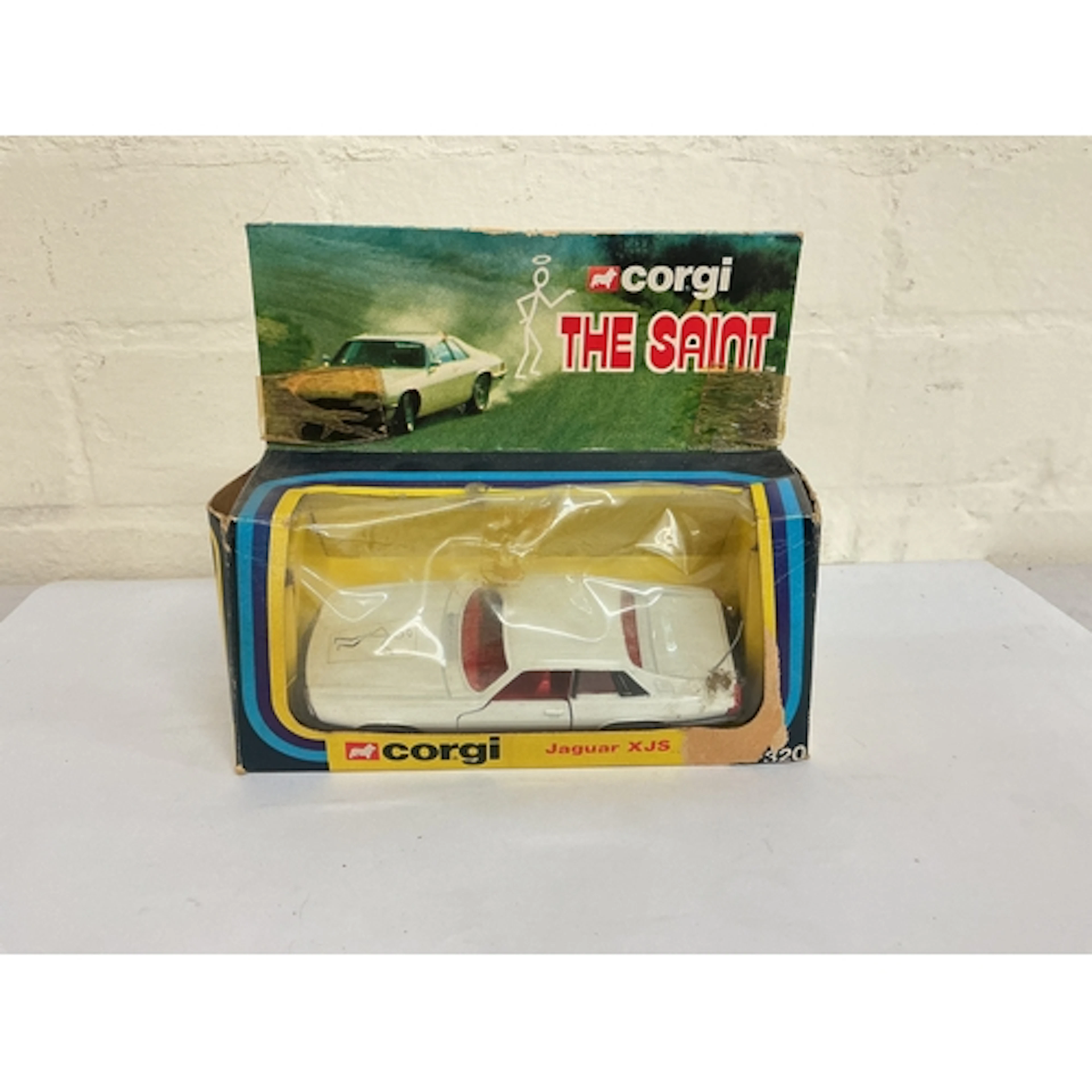 A Boxed Corgi The Saint Jaguar XJS #320. Box Is Worn, No Res...