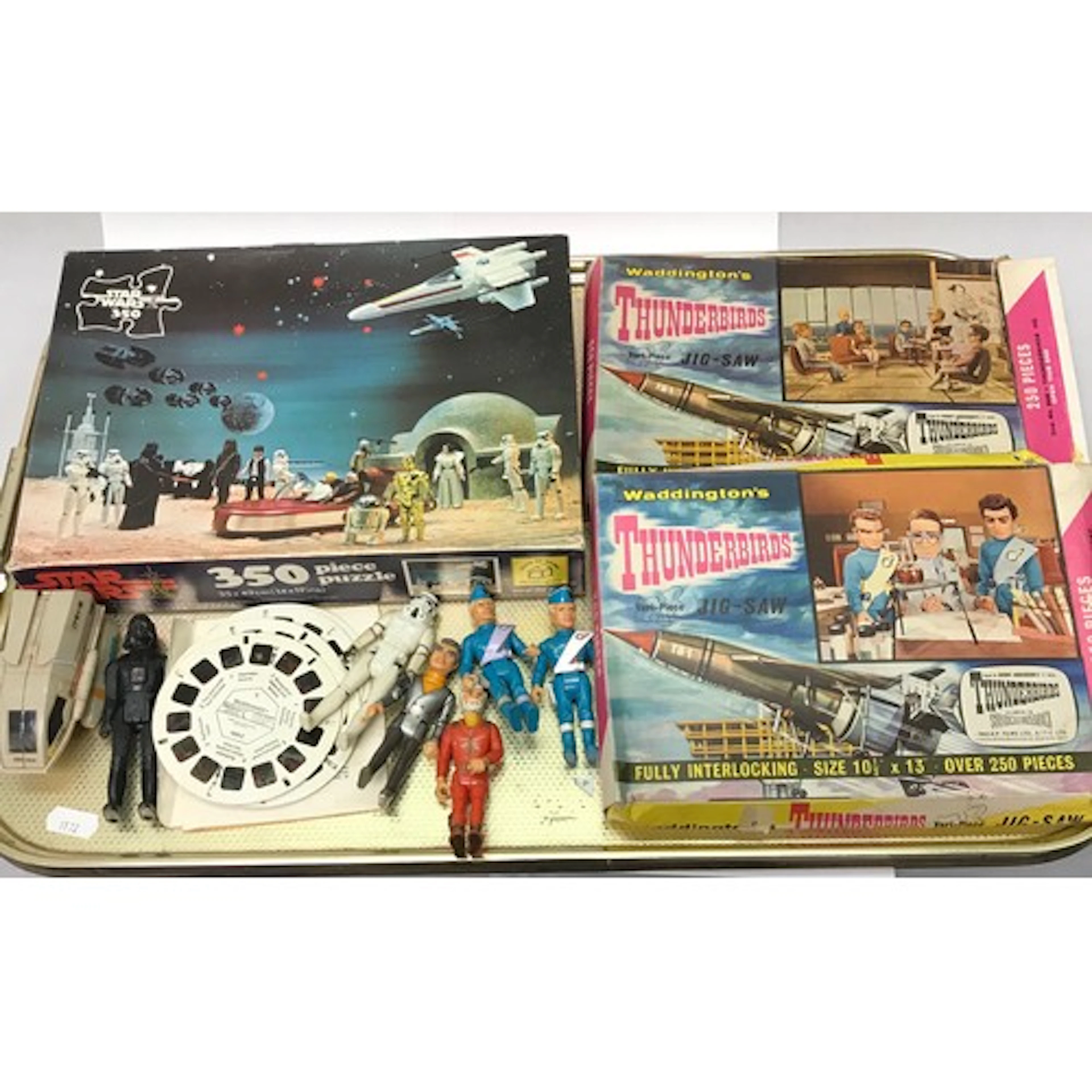 Various action figures, jigsaws etc, variously Thunderbirds ...