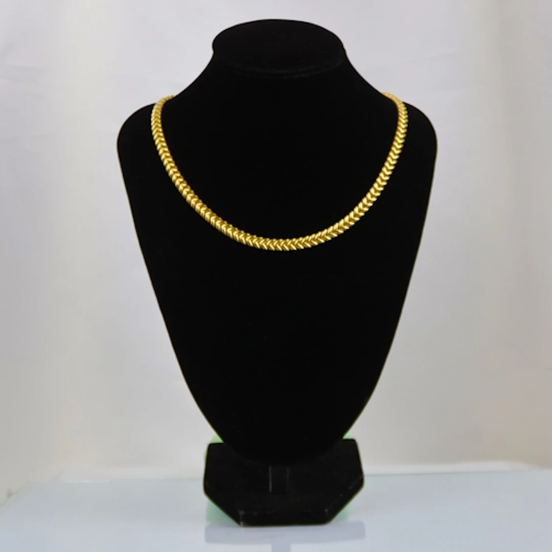 A contemporary Italian 18ct yellow gold necklace, designed a...