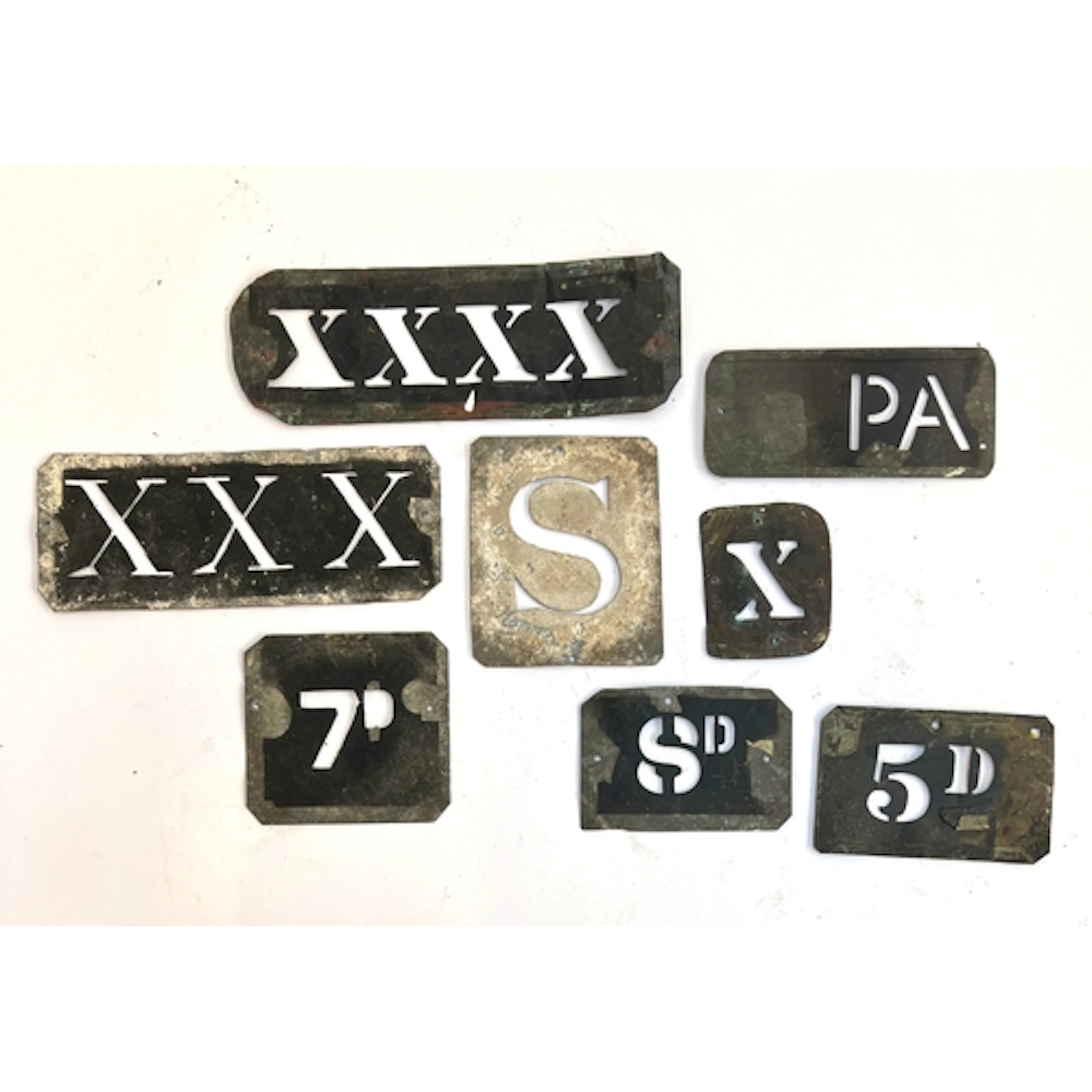 A number of antique stencils, to include prices