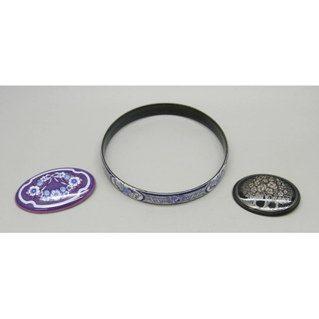 Two Michaela Frey enamel brooches, and a Michaela Frey bangl...