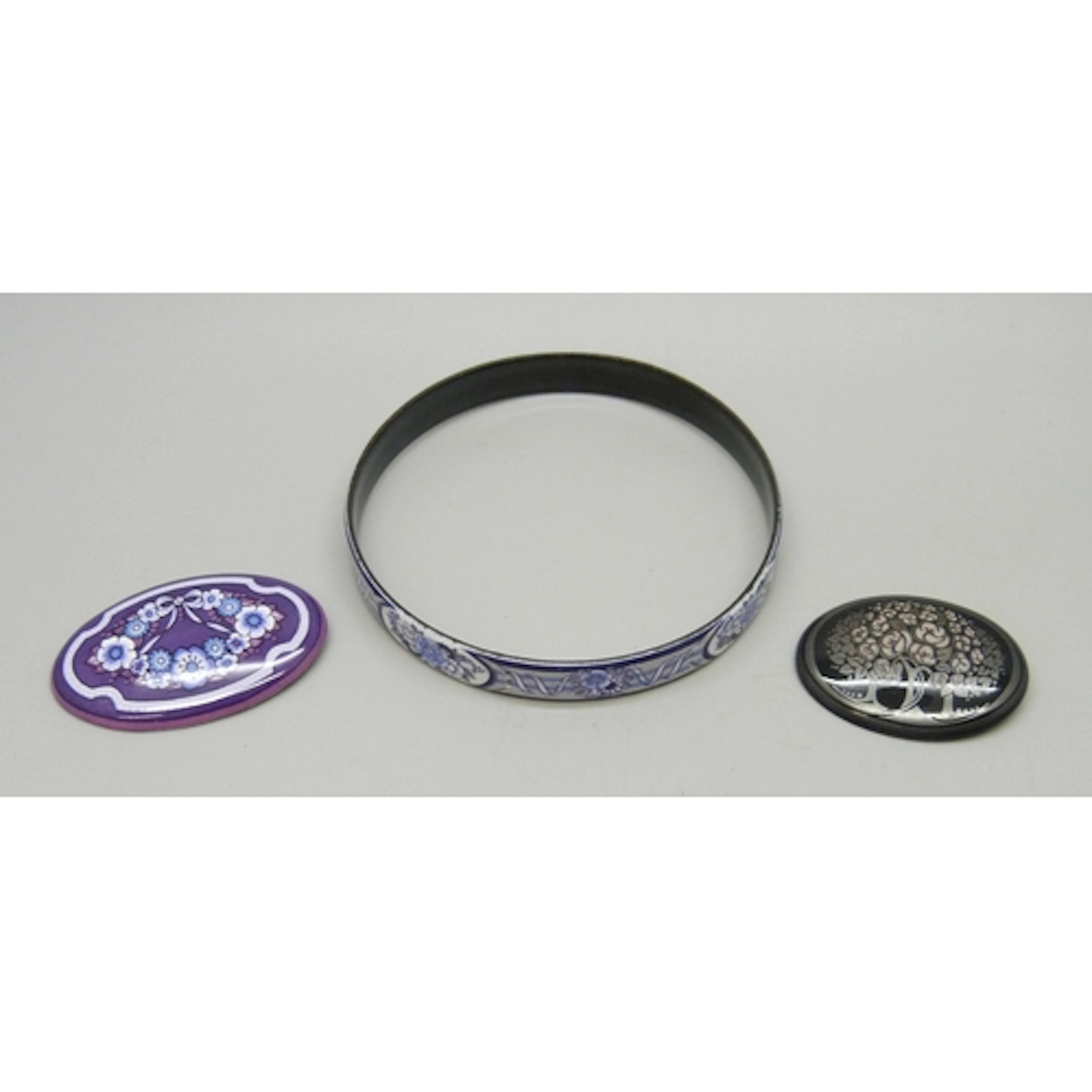 Two Michaela Frey enamel brooches, and a Michaela Frey bangl...