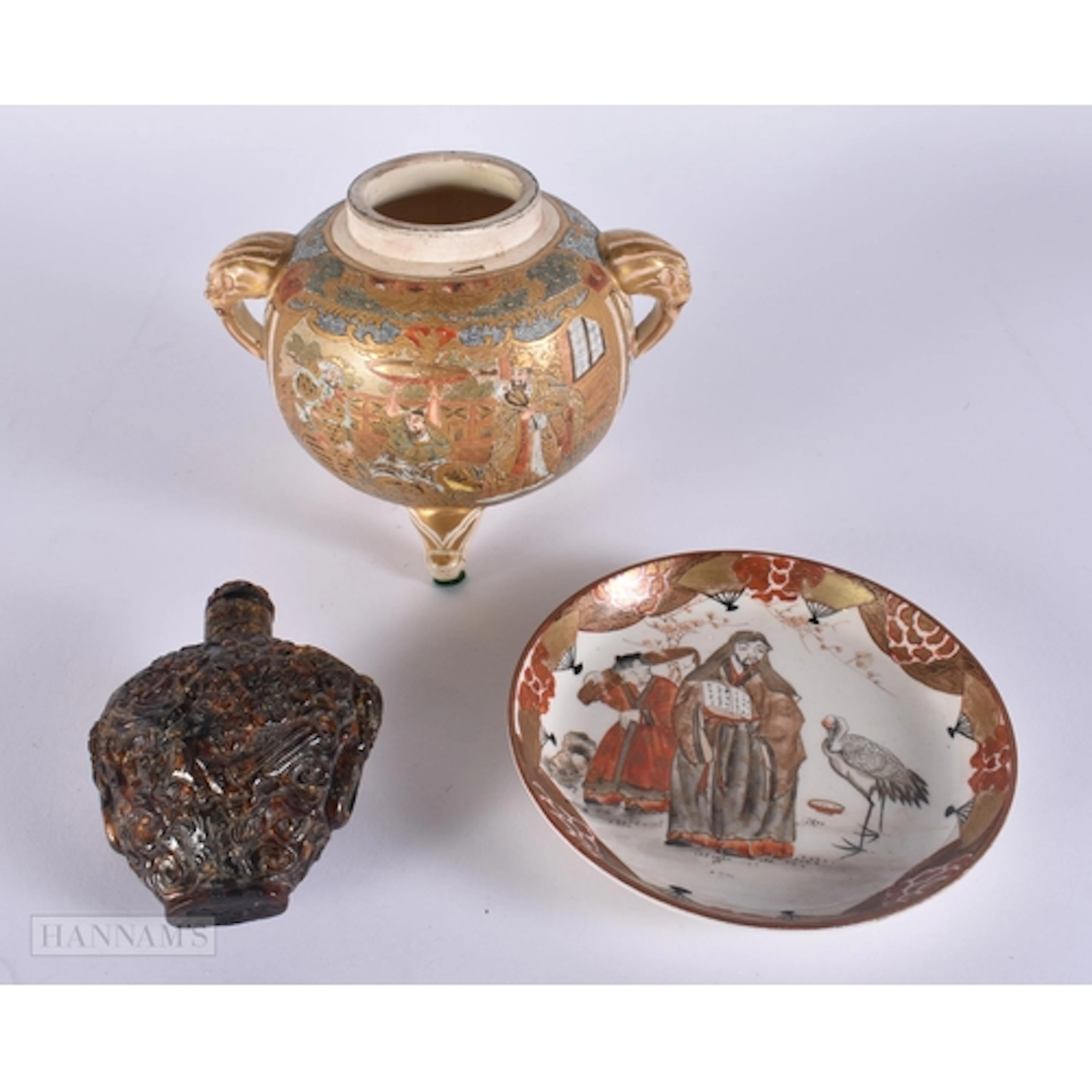 A 19TH CENTURY CHINESE AMBER SNUFF BOTTLE AND STOPPER Late Q...