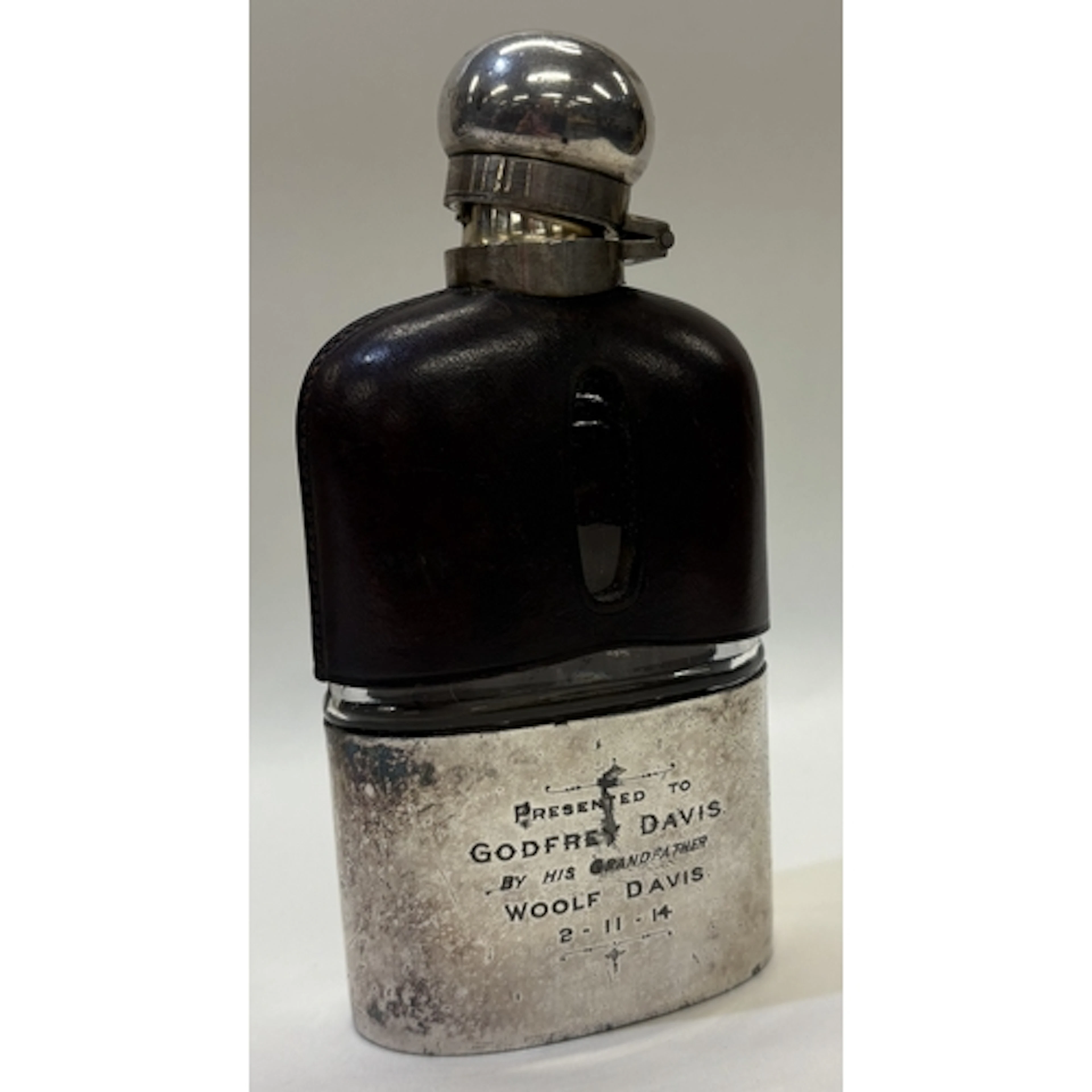 A 19th Century silver-mounted drinking flask. Est. £30 - £40...