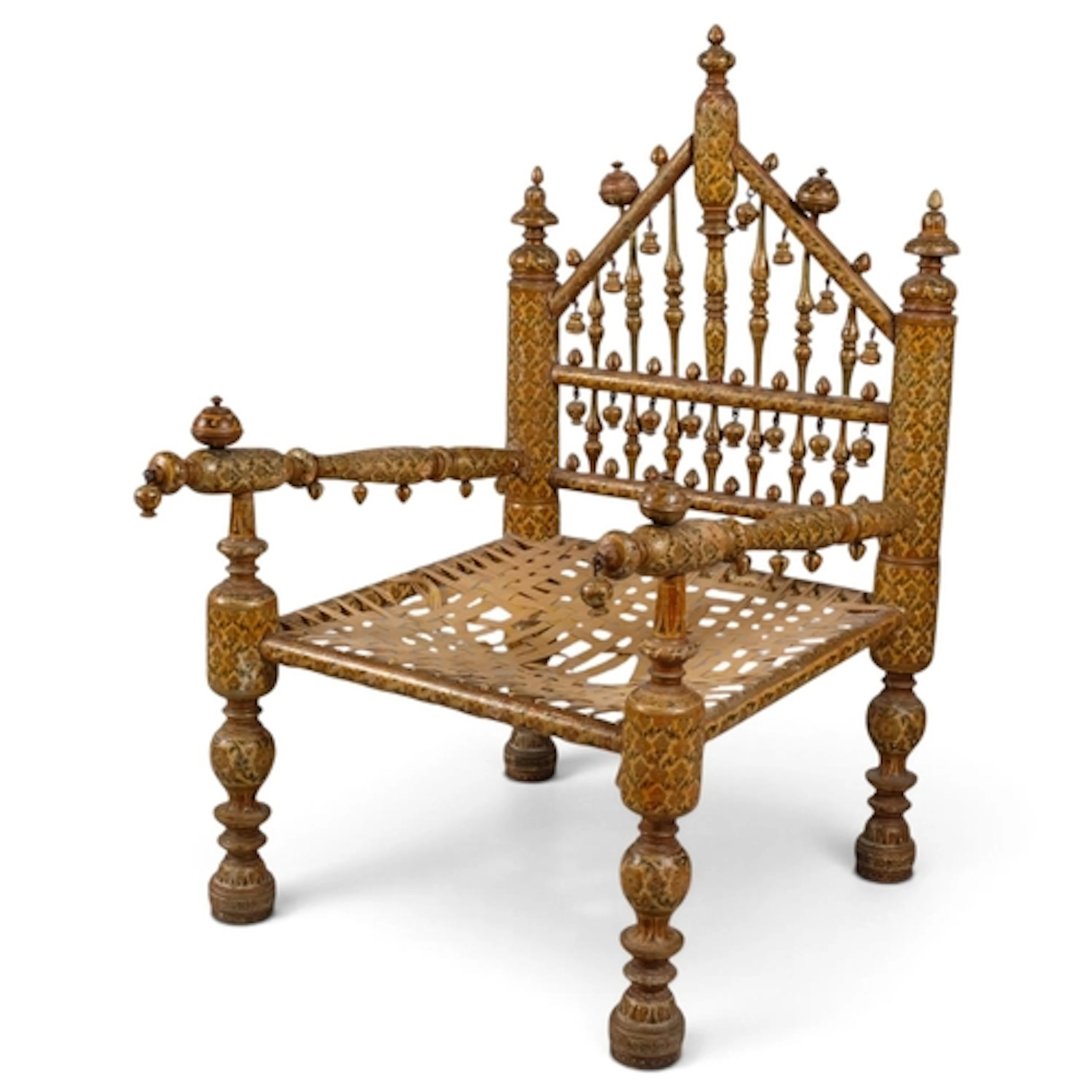 An Indian ceremonial wedding chair, painted and gilded wood ...