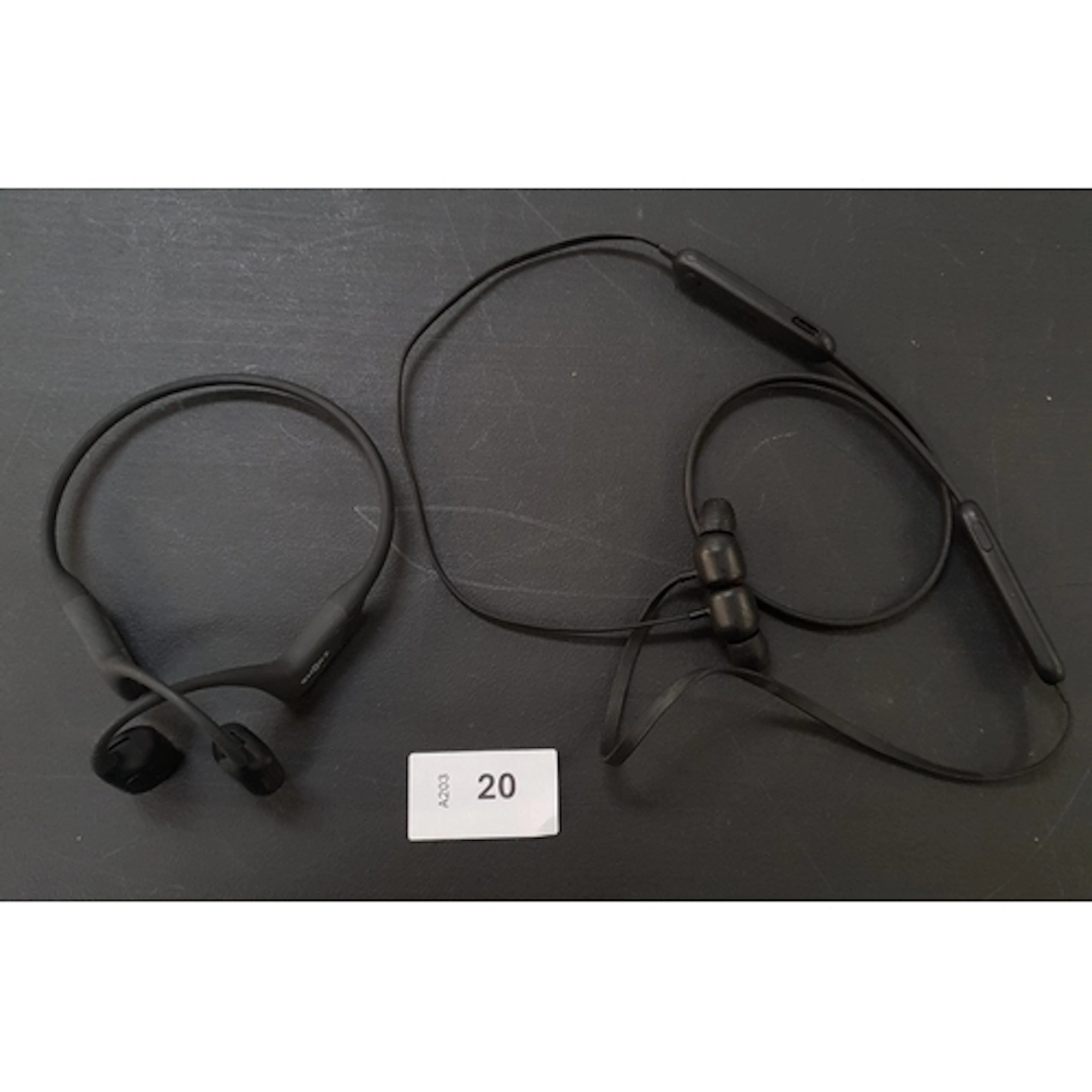 TWO PAIRS OF HEADPHONES including Shokz and Beats