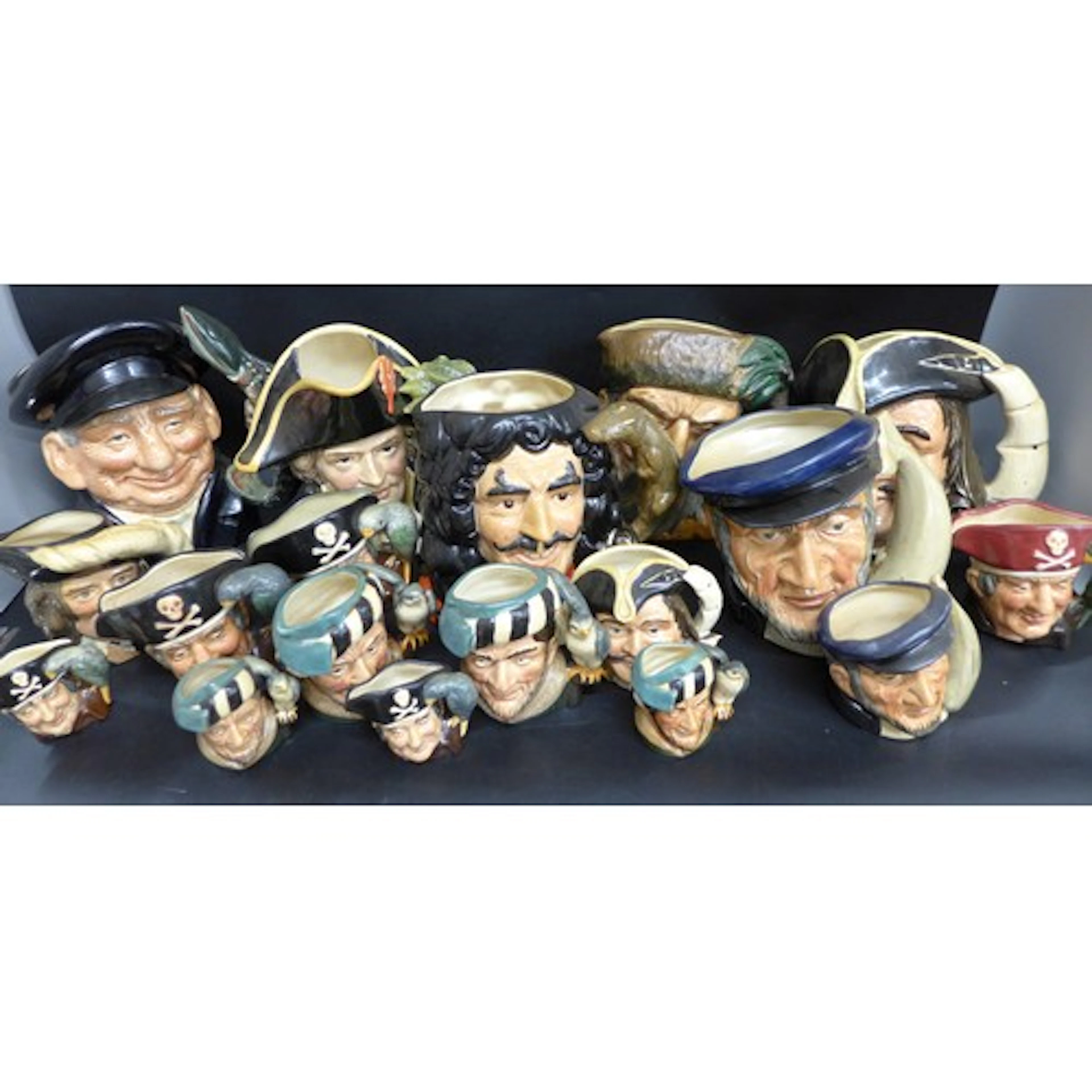 Six large toby jugs and ten miniatures to include Captain Ho...