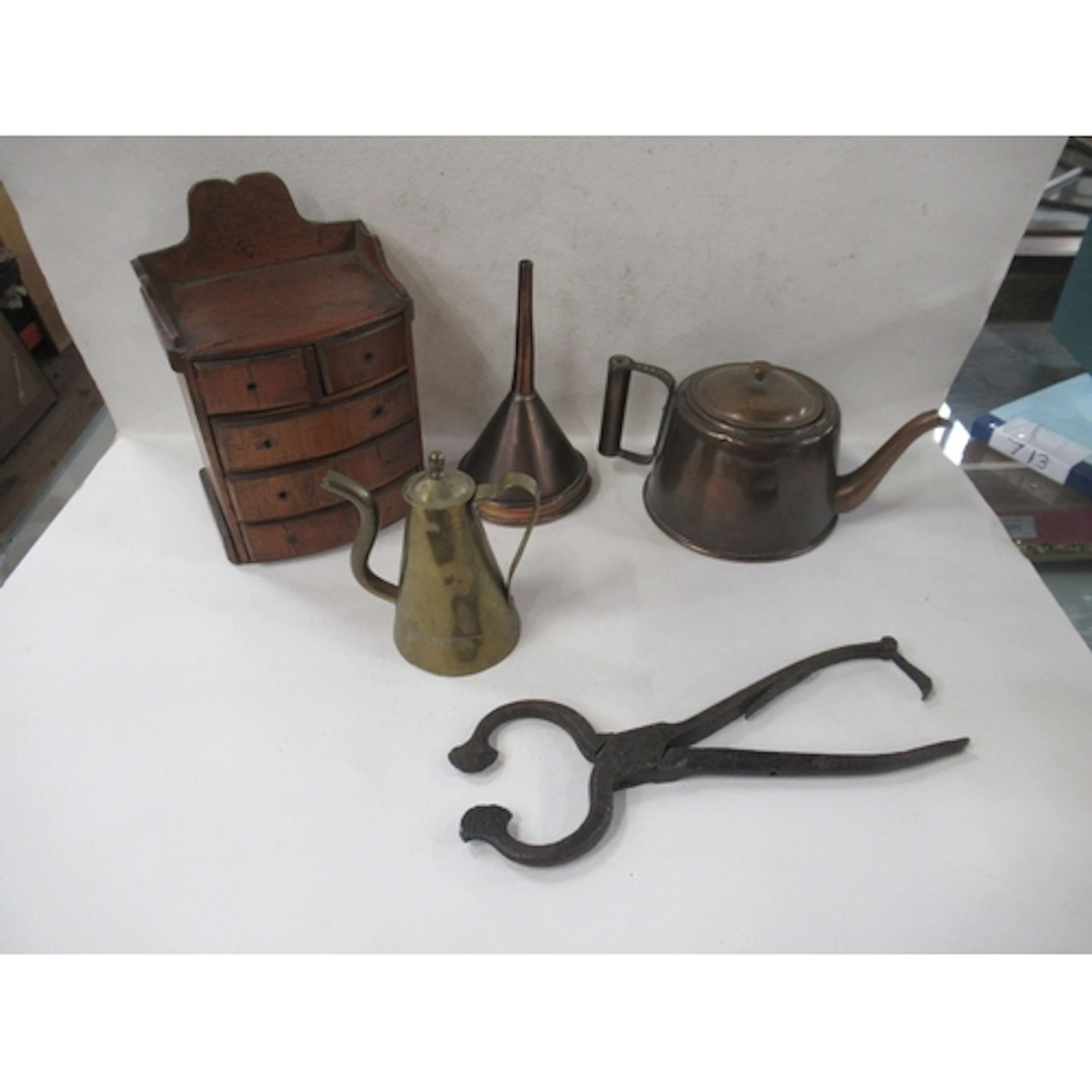 A pair of antique sugar nips, together with a metal tea pot ...