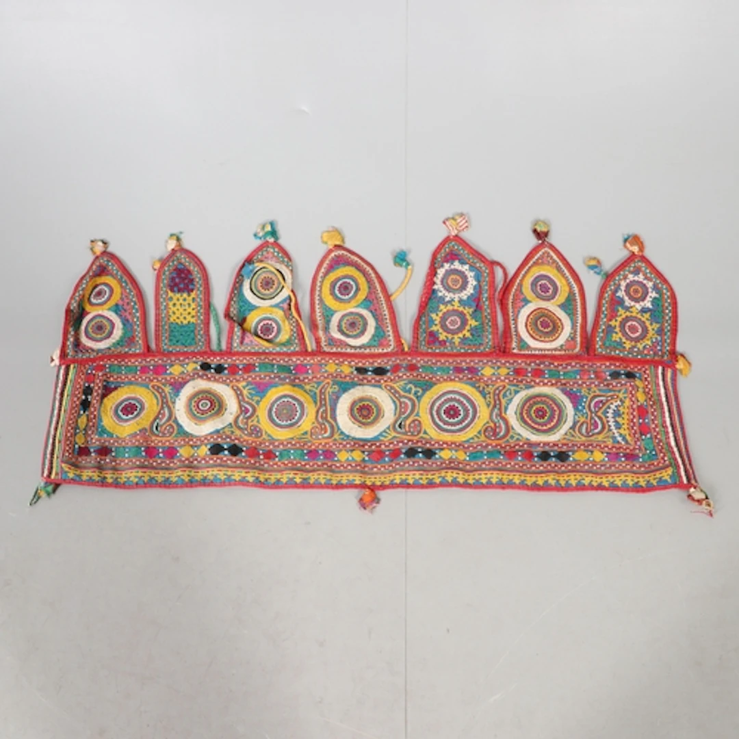 AN INDIAN DOOR VALANCE (TORAN). late 19th/early 20th century...