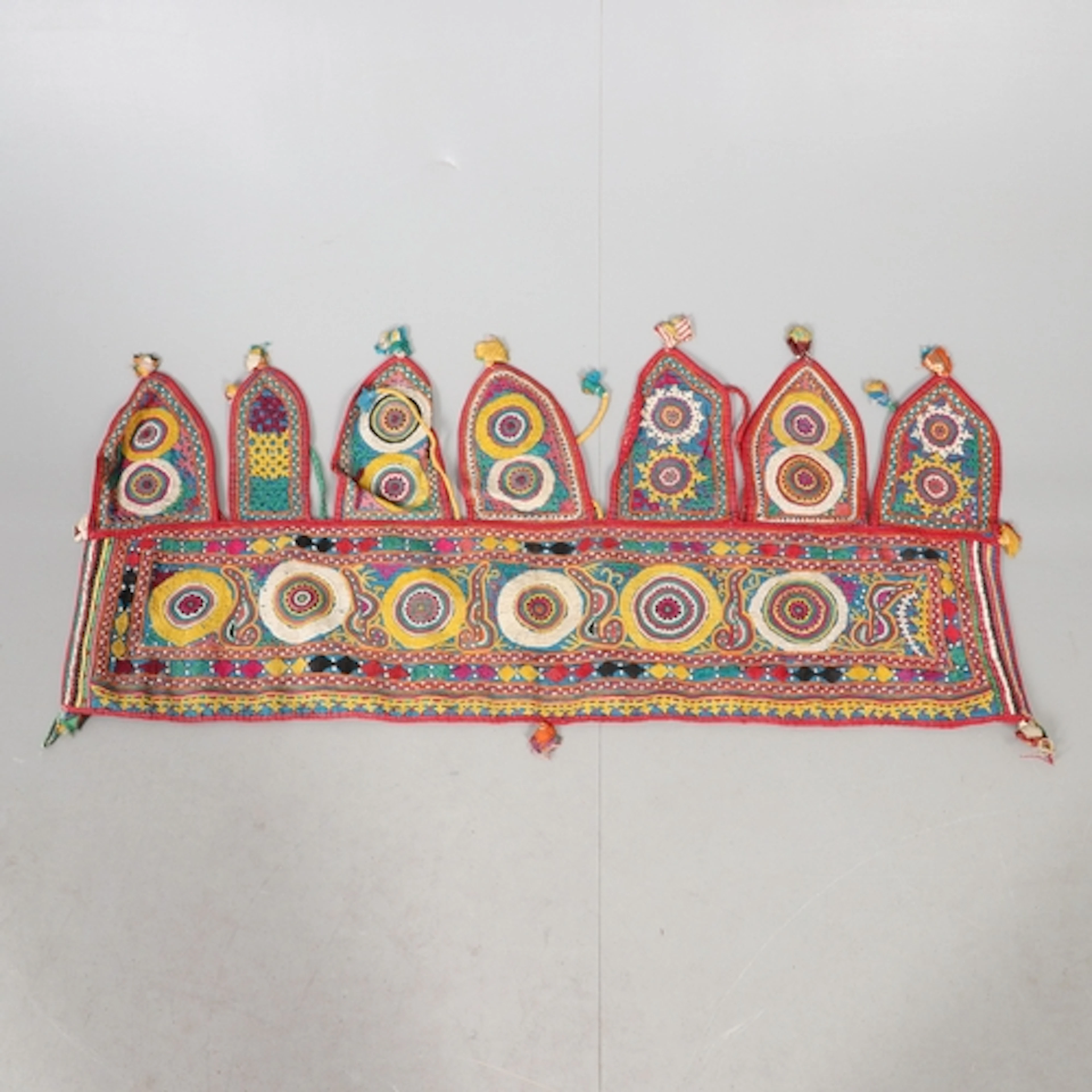 AN INDIAN DOOR VALANCE (TORAN). late 19th/early 20th century...
