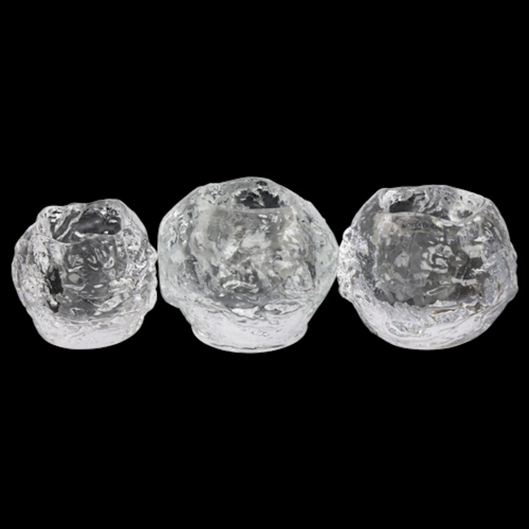 Three Kosta Boda clear glass Snowball tea light holders, one...