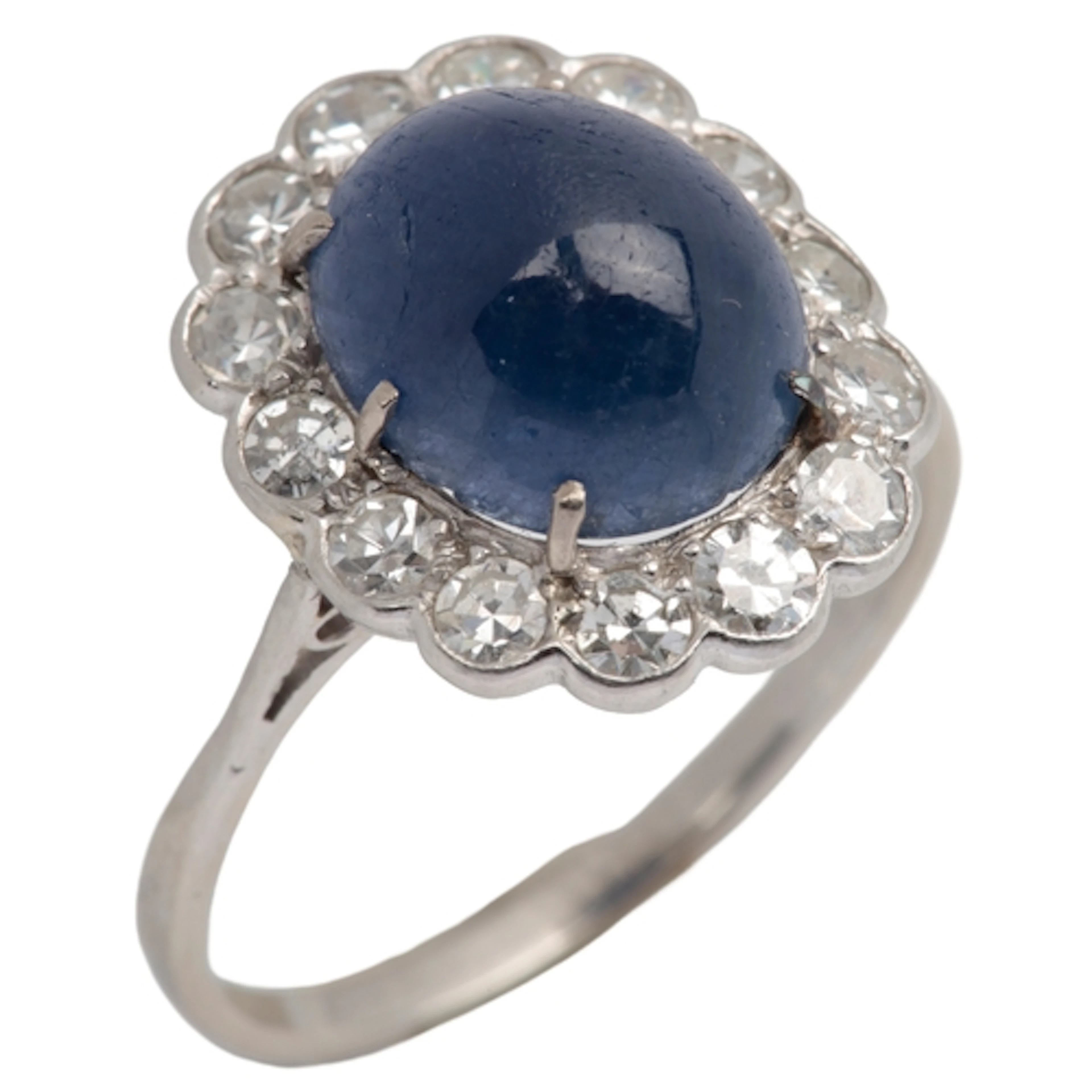 A sapphire and diamond cluster ring, early 20th century, cla...