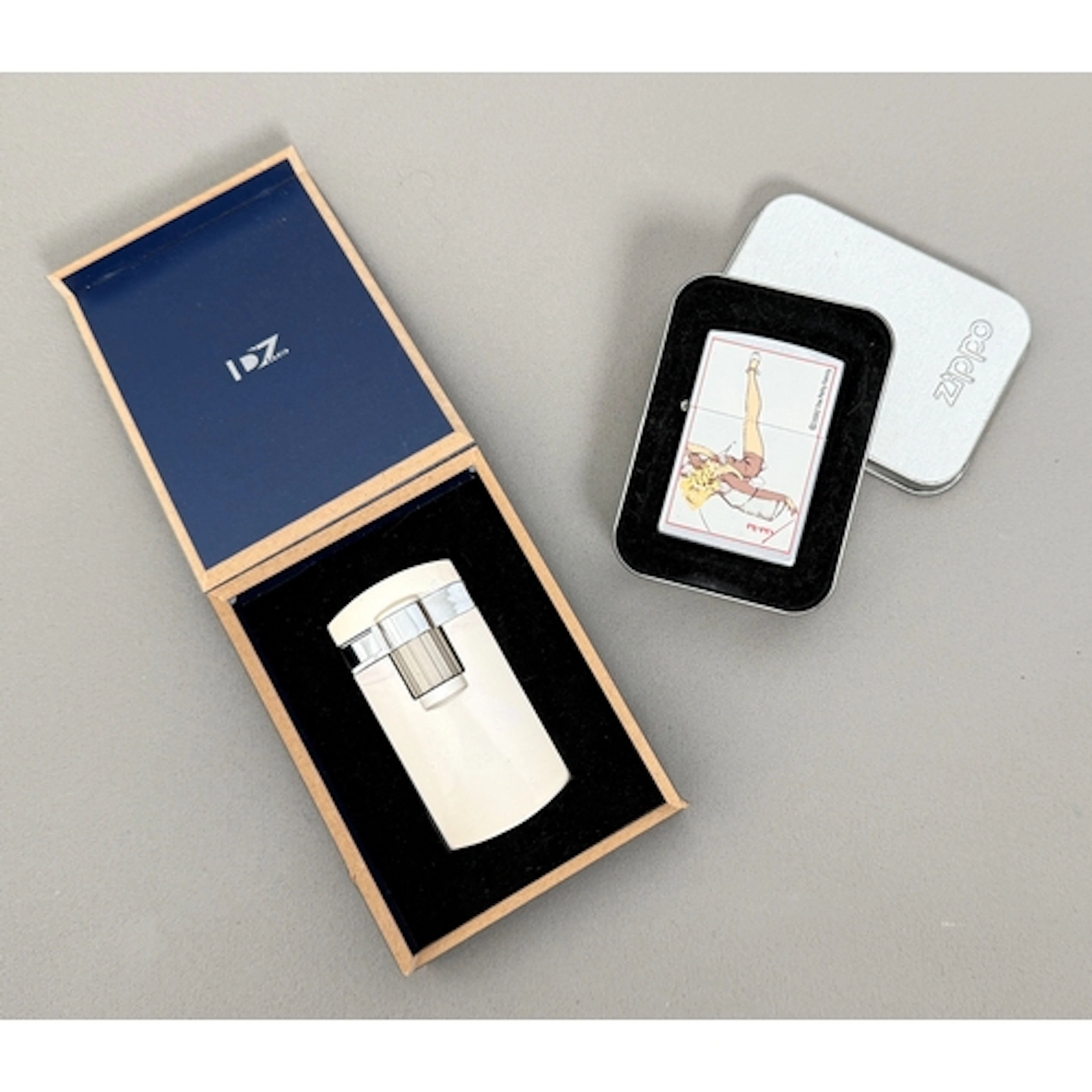 A Zippo 'Petty' cigarette lighter - 'Lazy Lady' design, 2002...