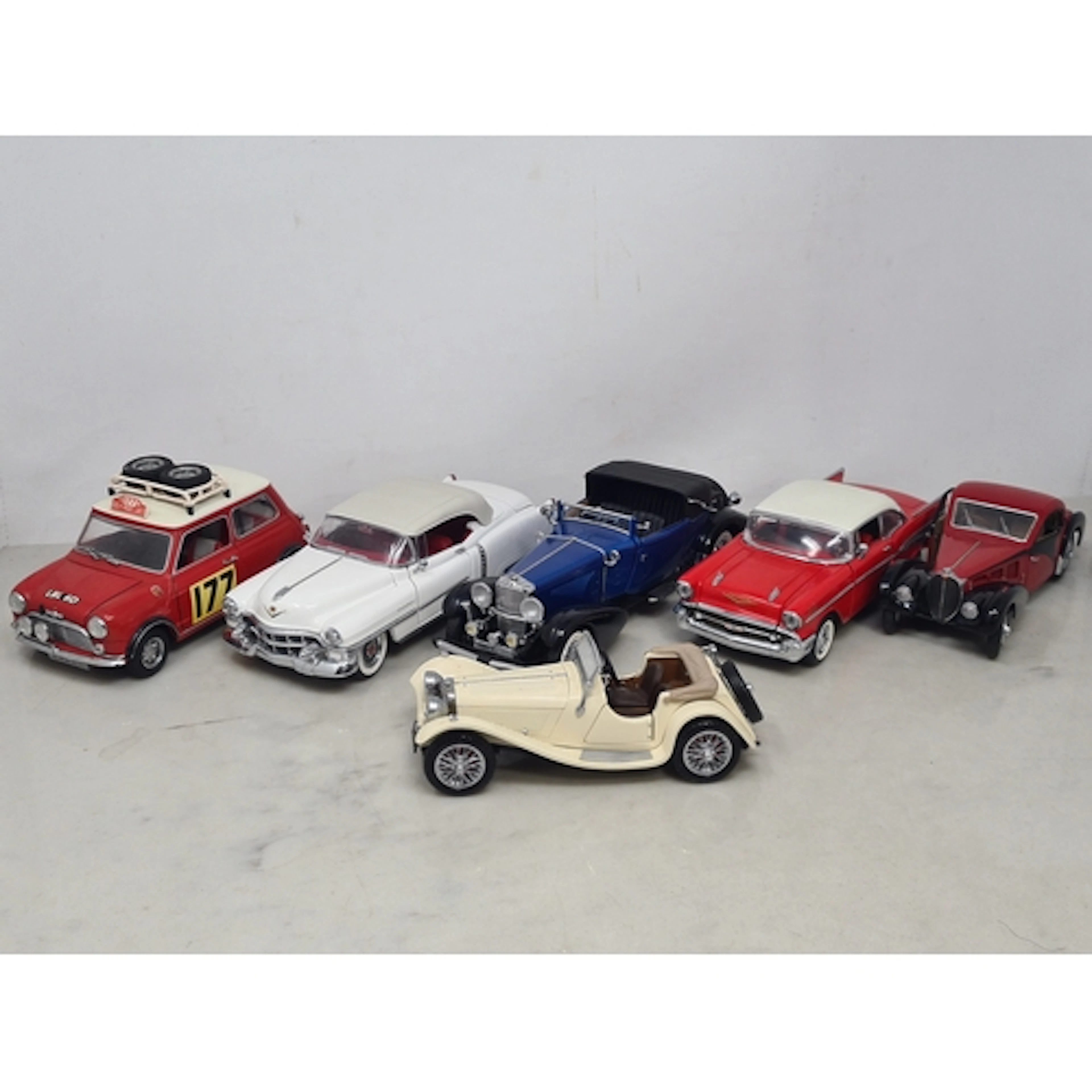 Five unboxed Franklin Mint 1:24 scale Models comprising 1953...