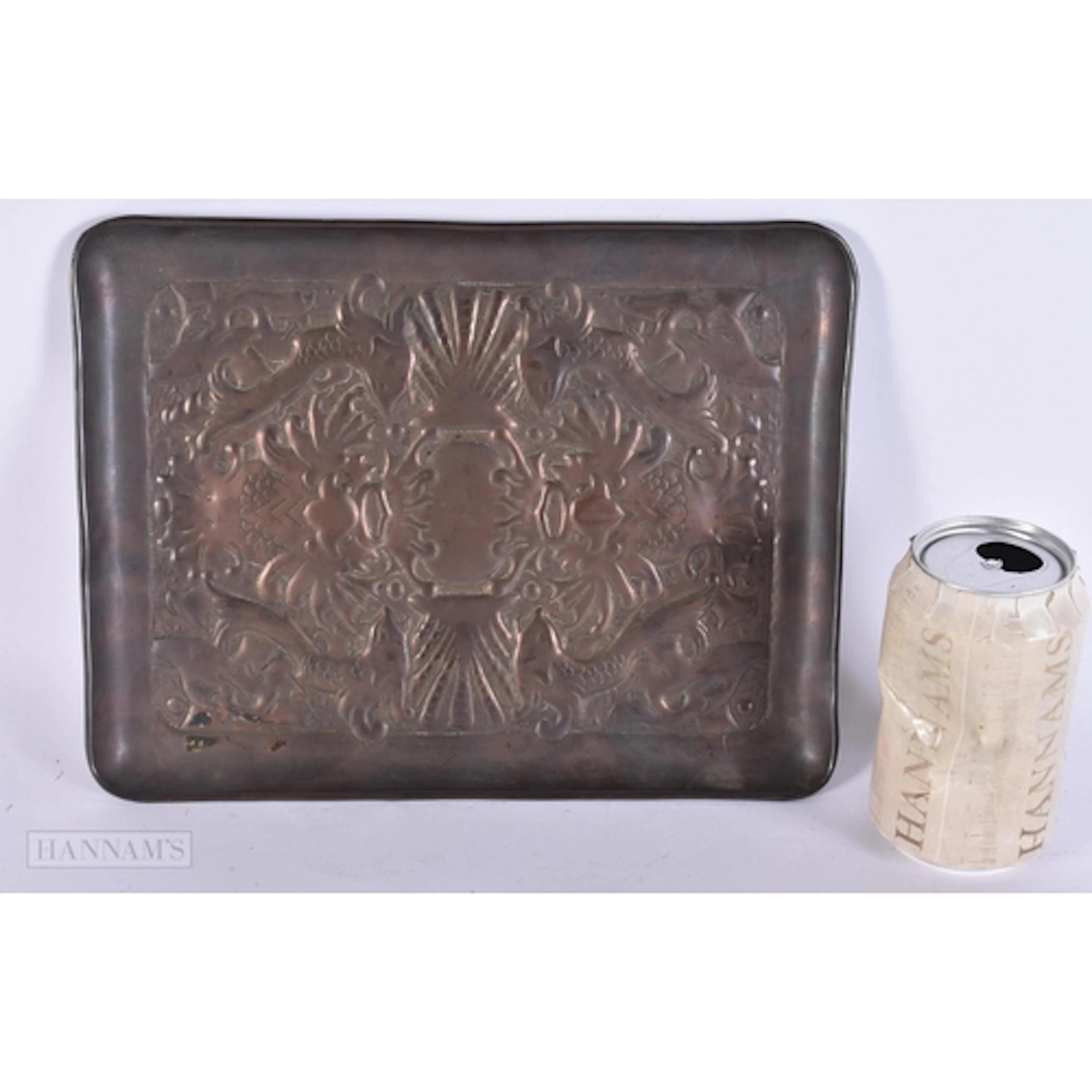 AN ARTS AND CRAFTS COPPER REPOUSSE TRAY possibly Newlyn. 17....
