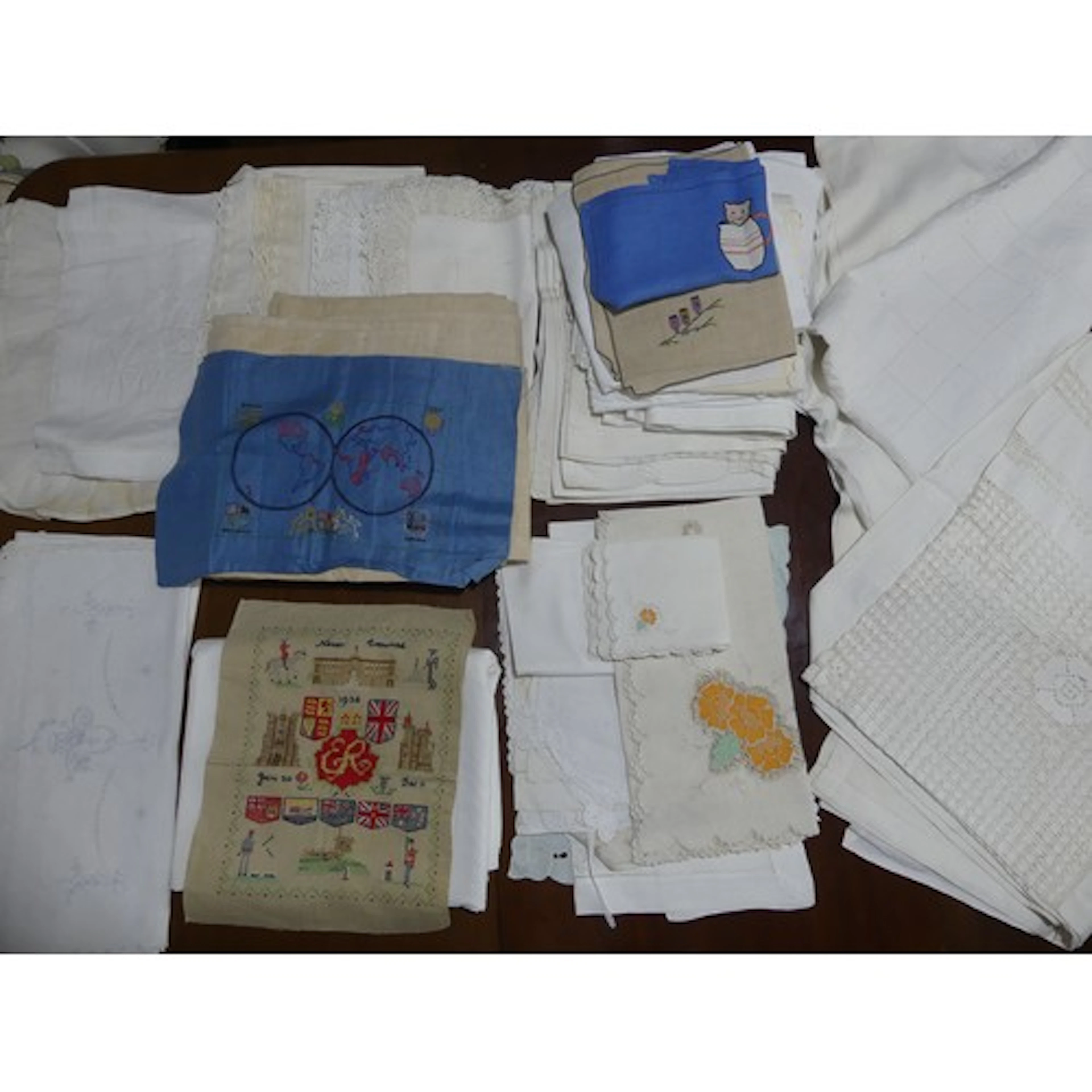 A collection of vintage Textiles, including two early 20th c...