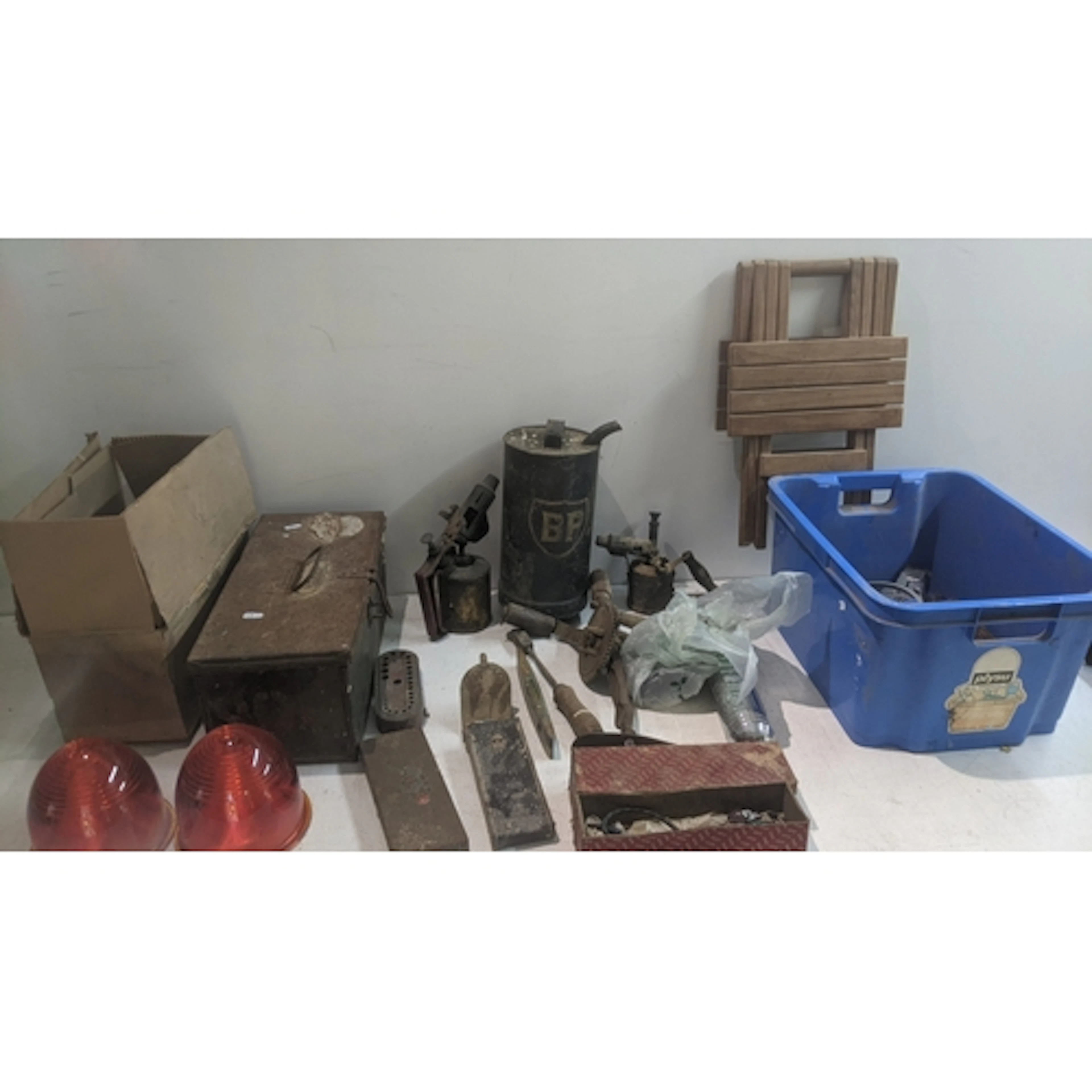 A collection of vintage tools and parts to include a BP petr...