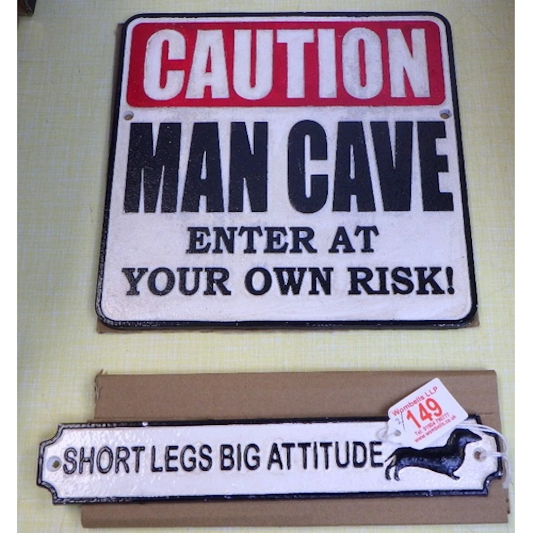 Two cast signs (2)