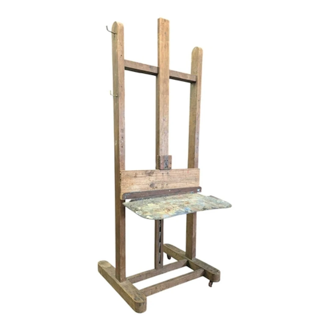 An early 20th century oak wooden artist's easel. Having a ri...