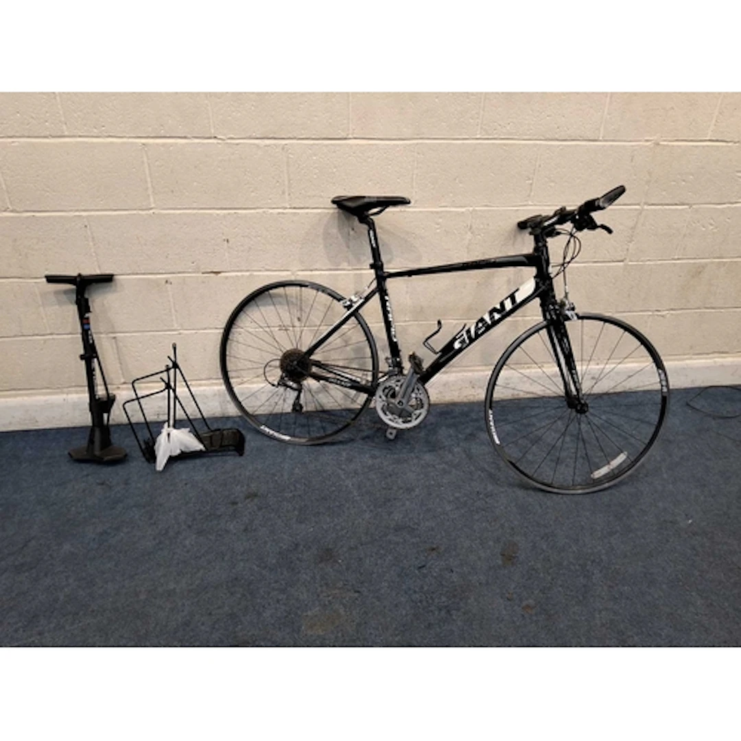 A GIANT RAPID COMPACT ROAD BIKE with 24 speed Shimano gears,...
