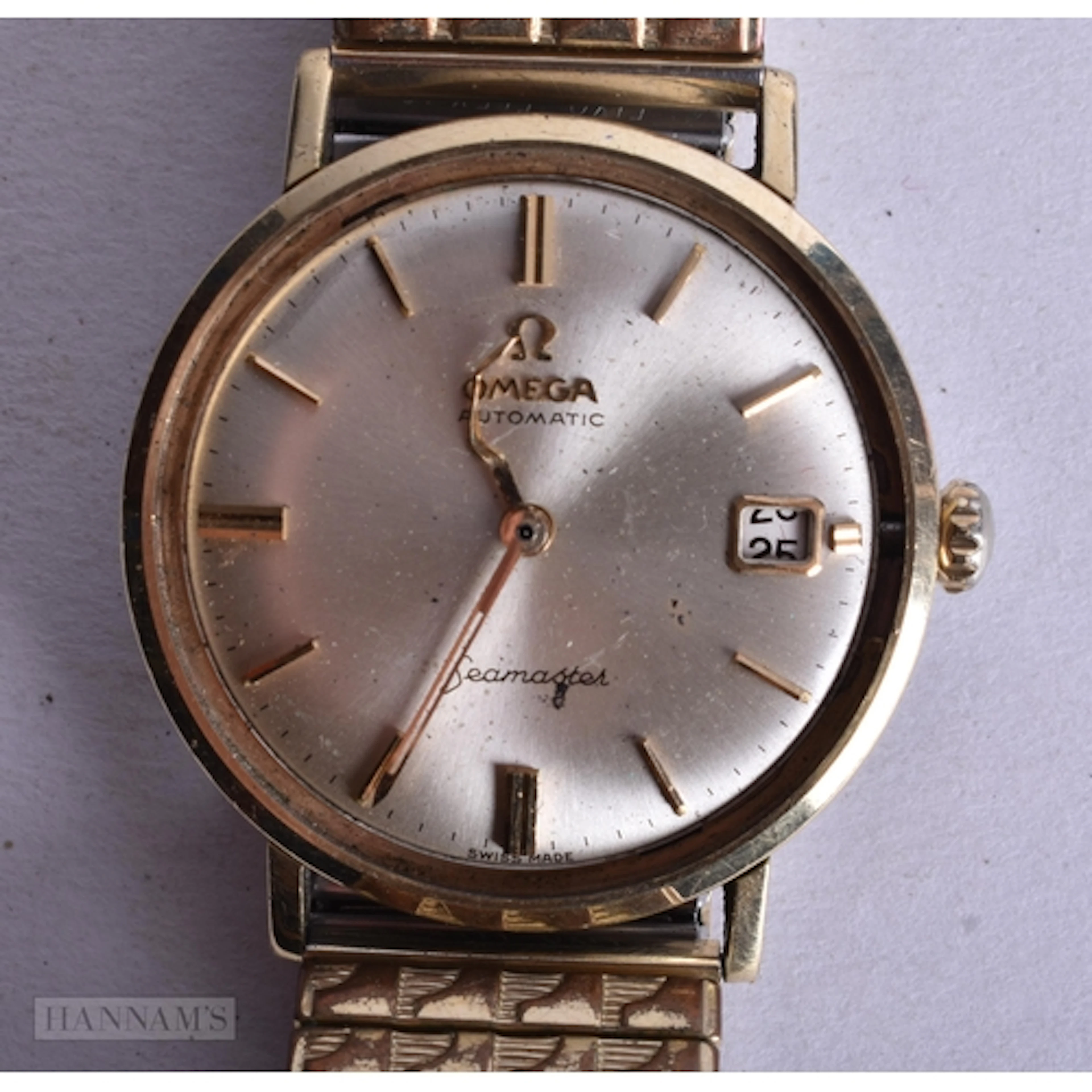 AN OMEGA SEAMASTER WRIST WATCH. Not running. 3.5 cm wide.
