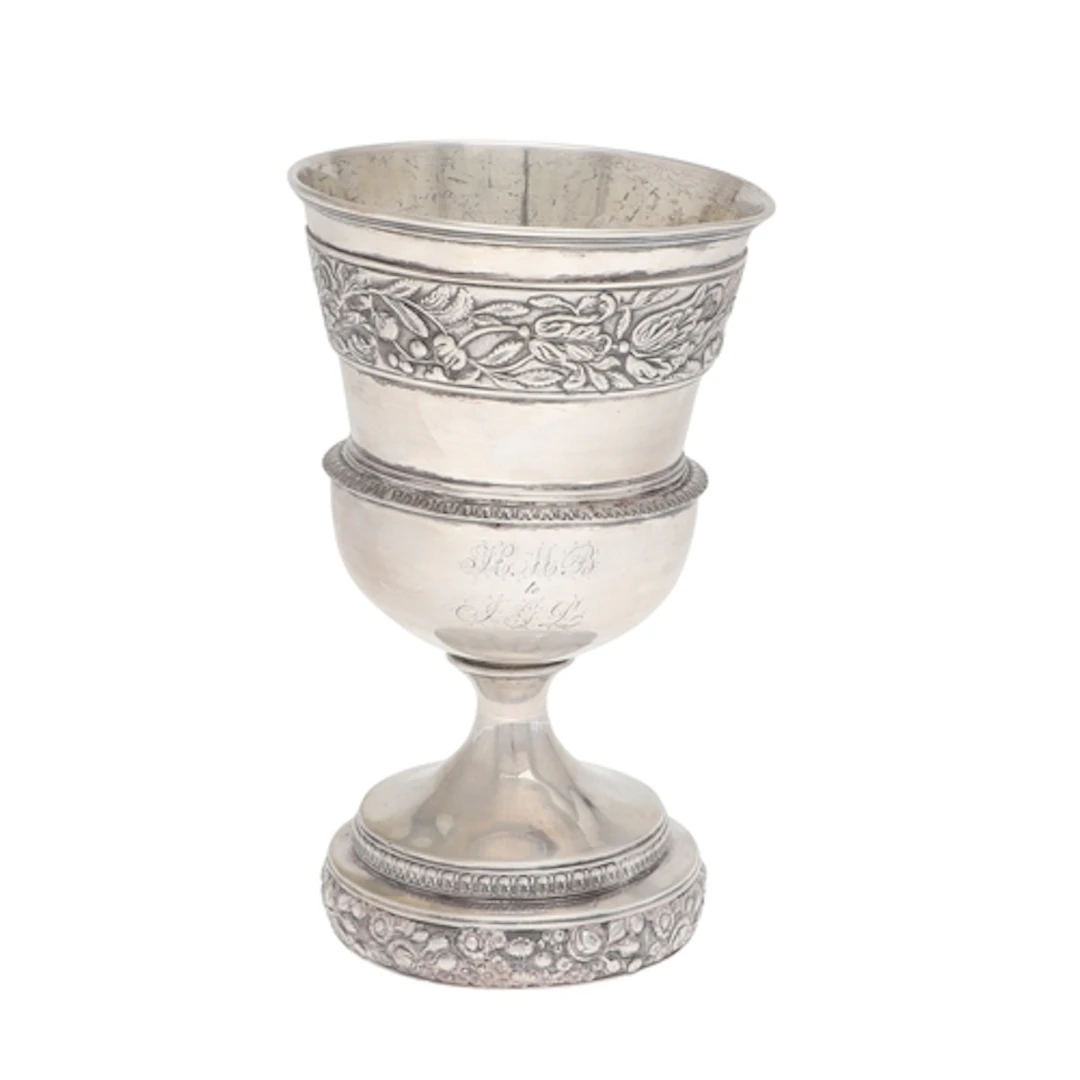 A GEORGE III SILVER GOBLET. Decorated with foliate and flora...