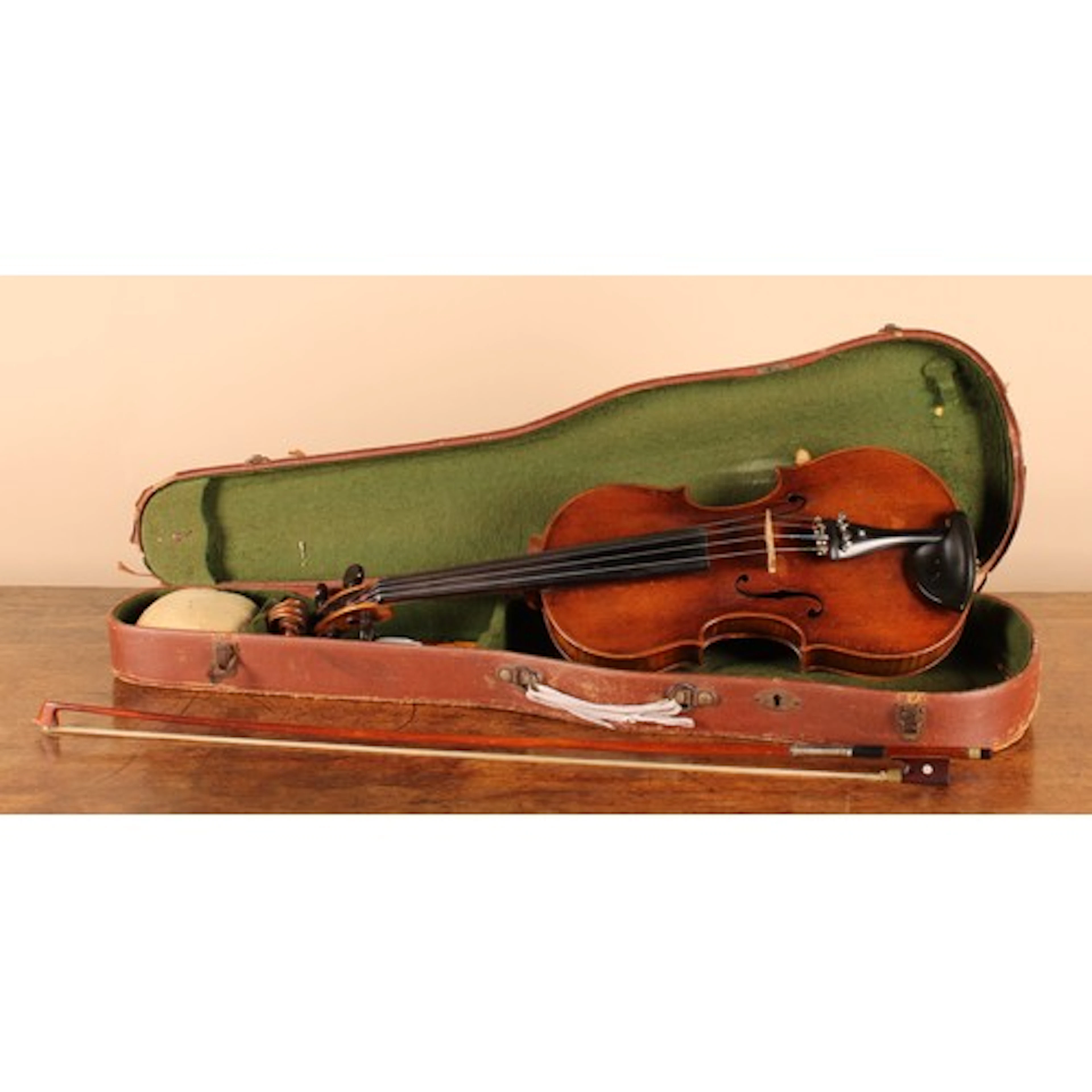 A violin, the one-piece back 36.5cm excluding button, paper ...