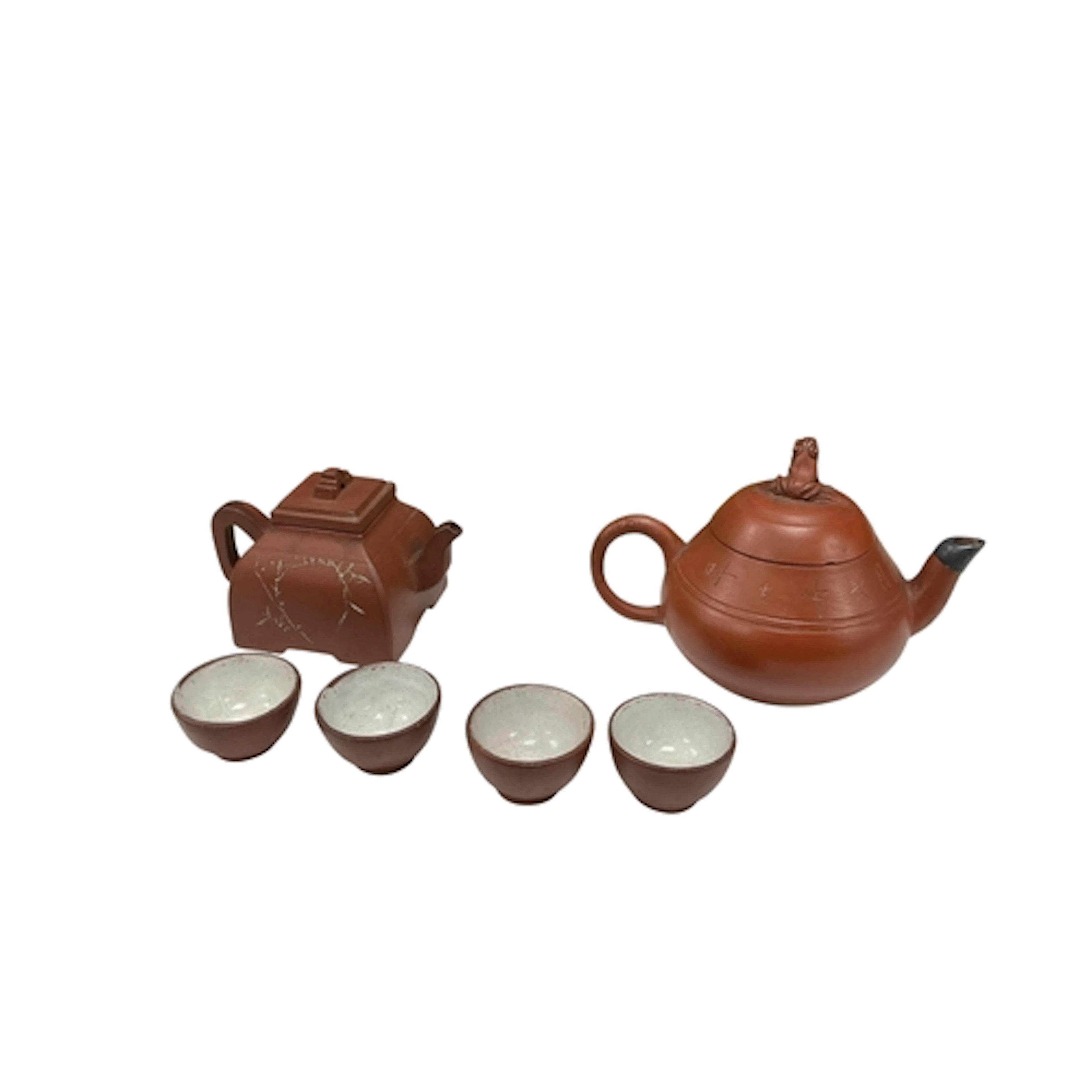 Two Chinese Yixing teapots, both with character marks, four ...