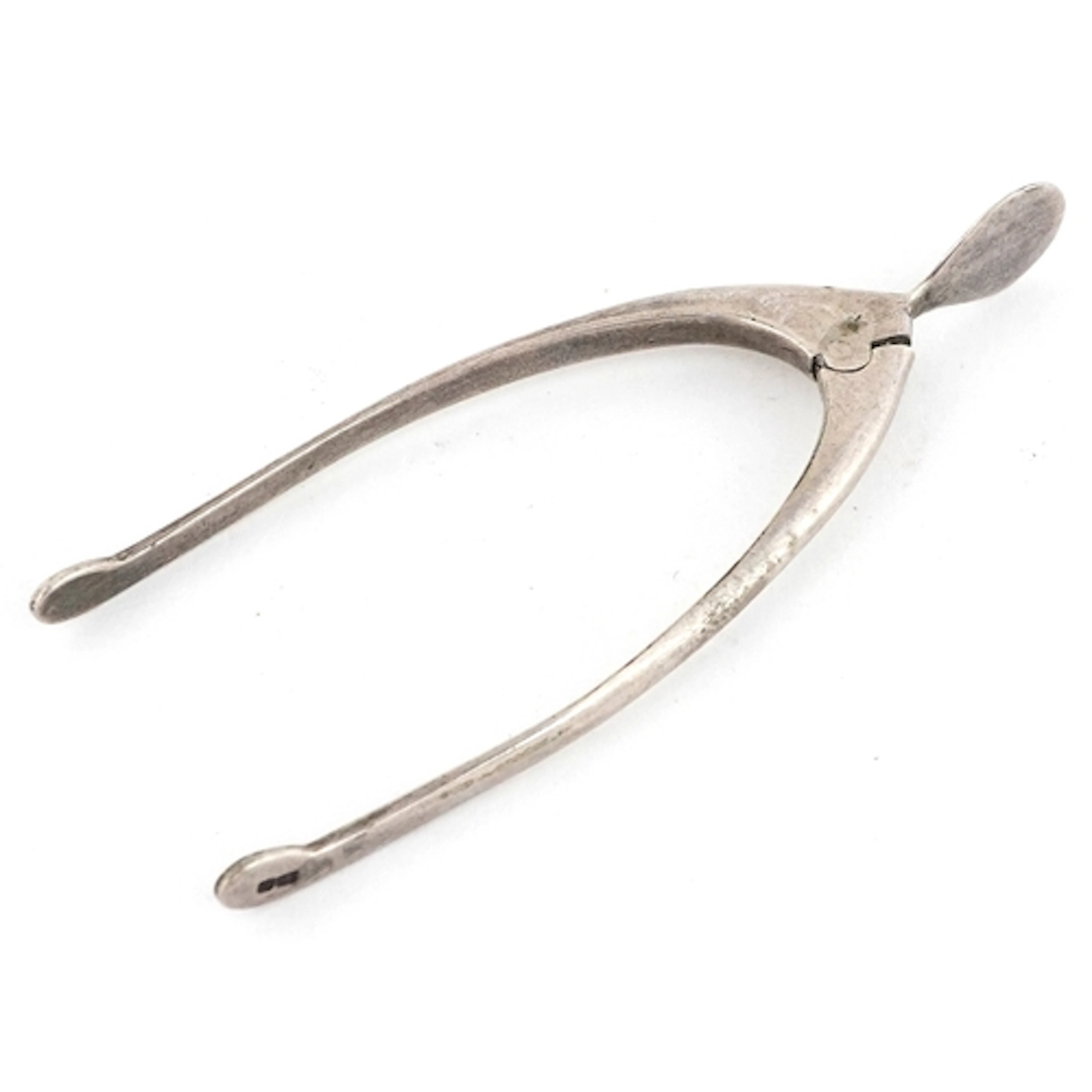 James Swann & Son, pair of George V silver wishbone sugar to...