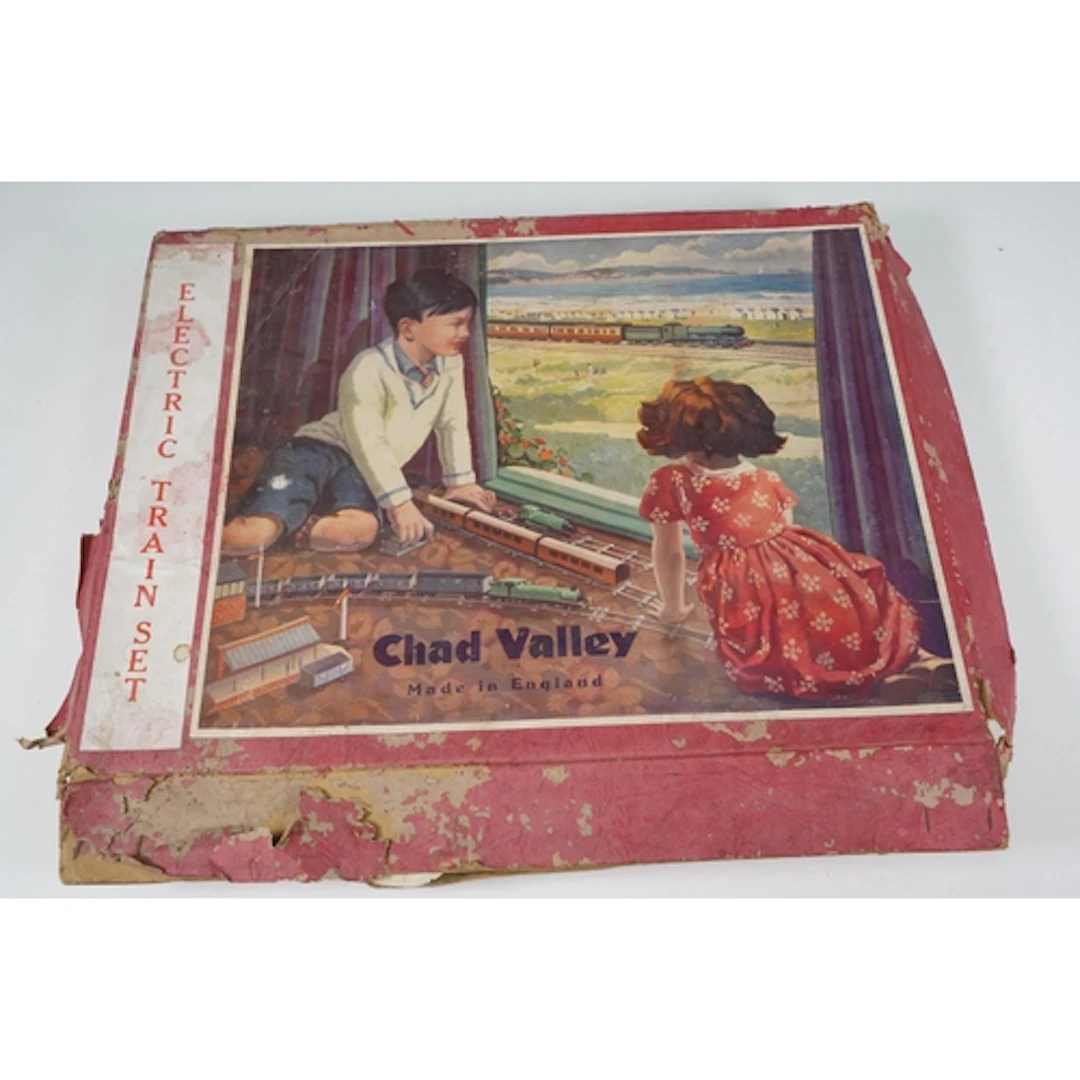 Two boxed O gauge tin plate train sets to include Mettoy Mec...