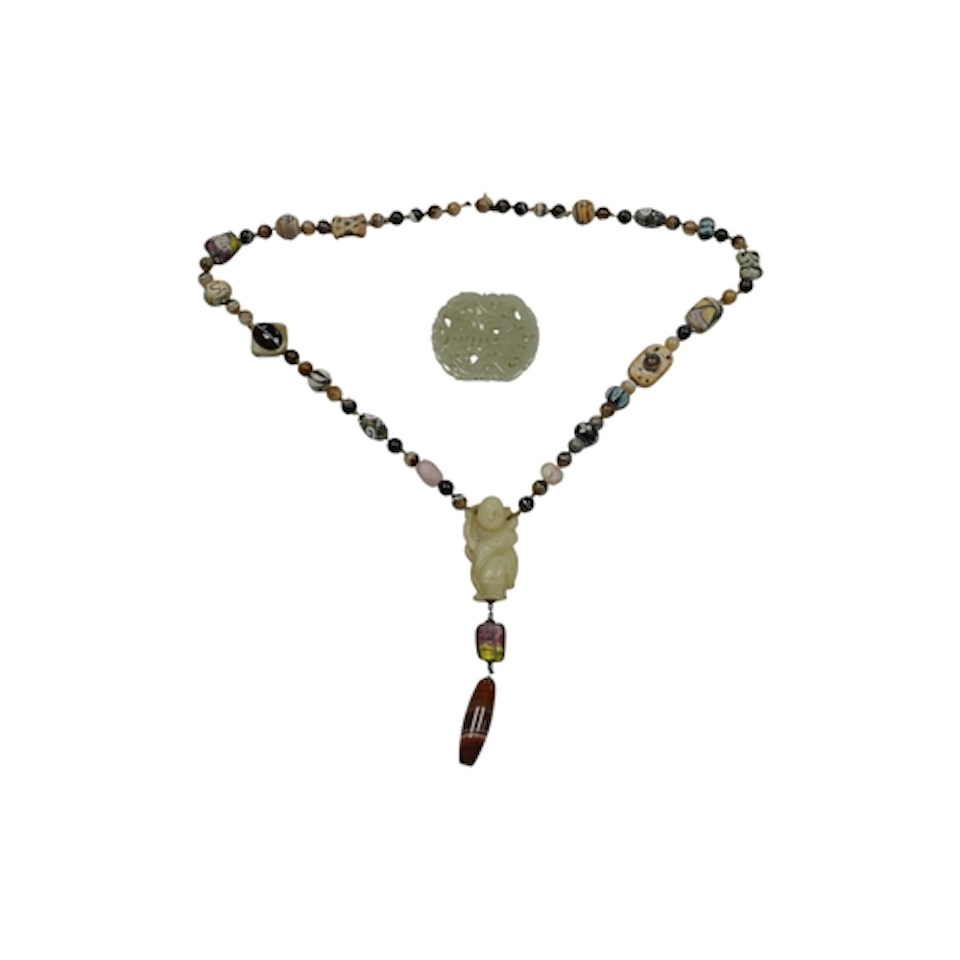 A Chinese pale celadon jade 'Shou' plaque and a jade pendant...