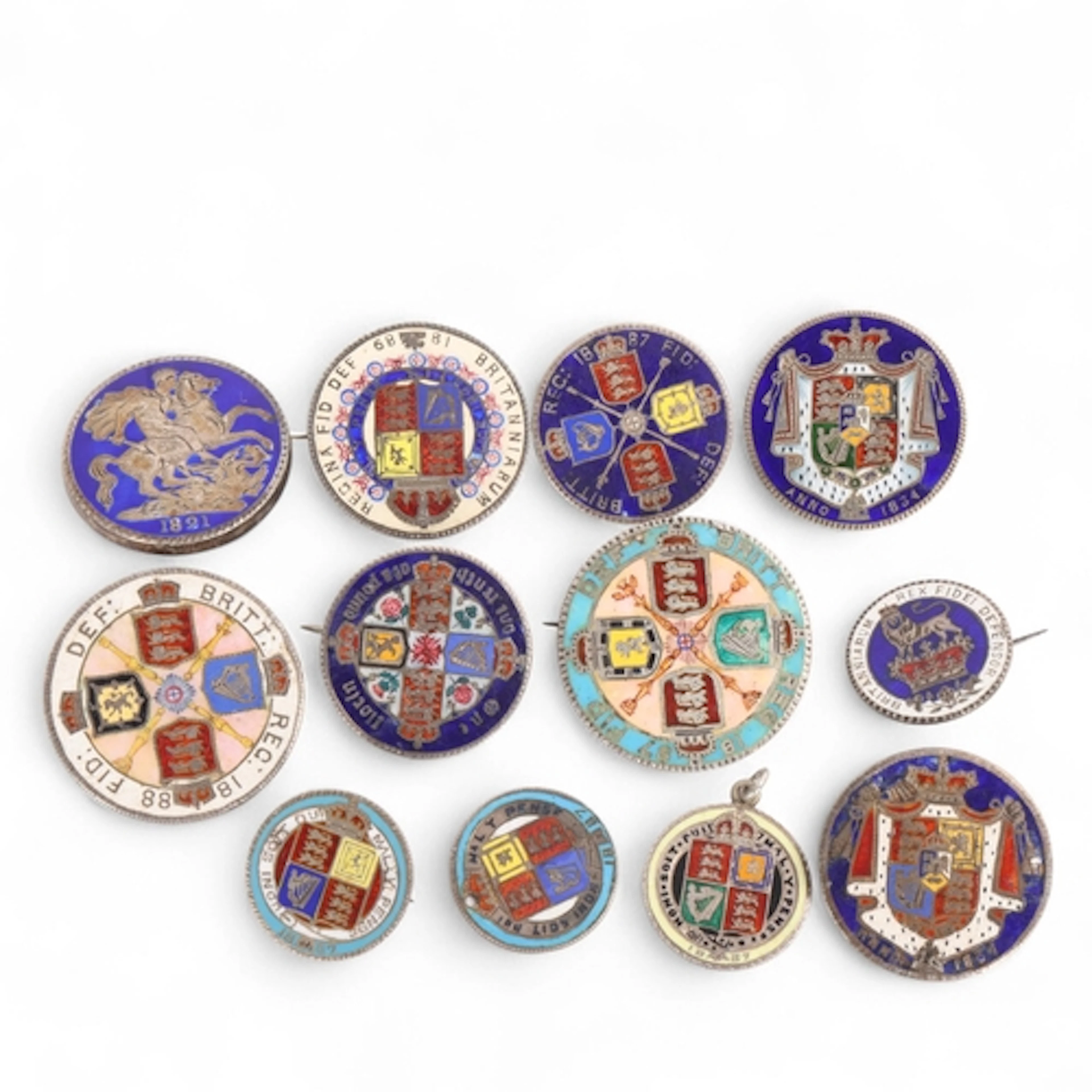 A collection of 19th century British silver coins with ename...