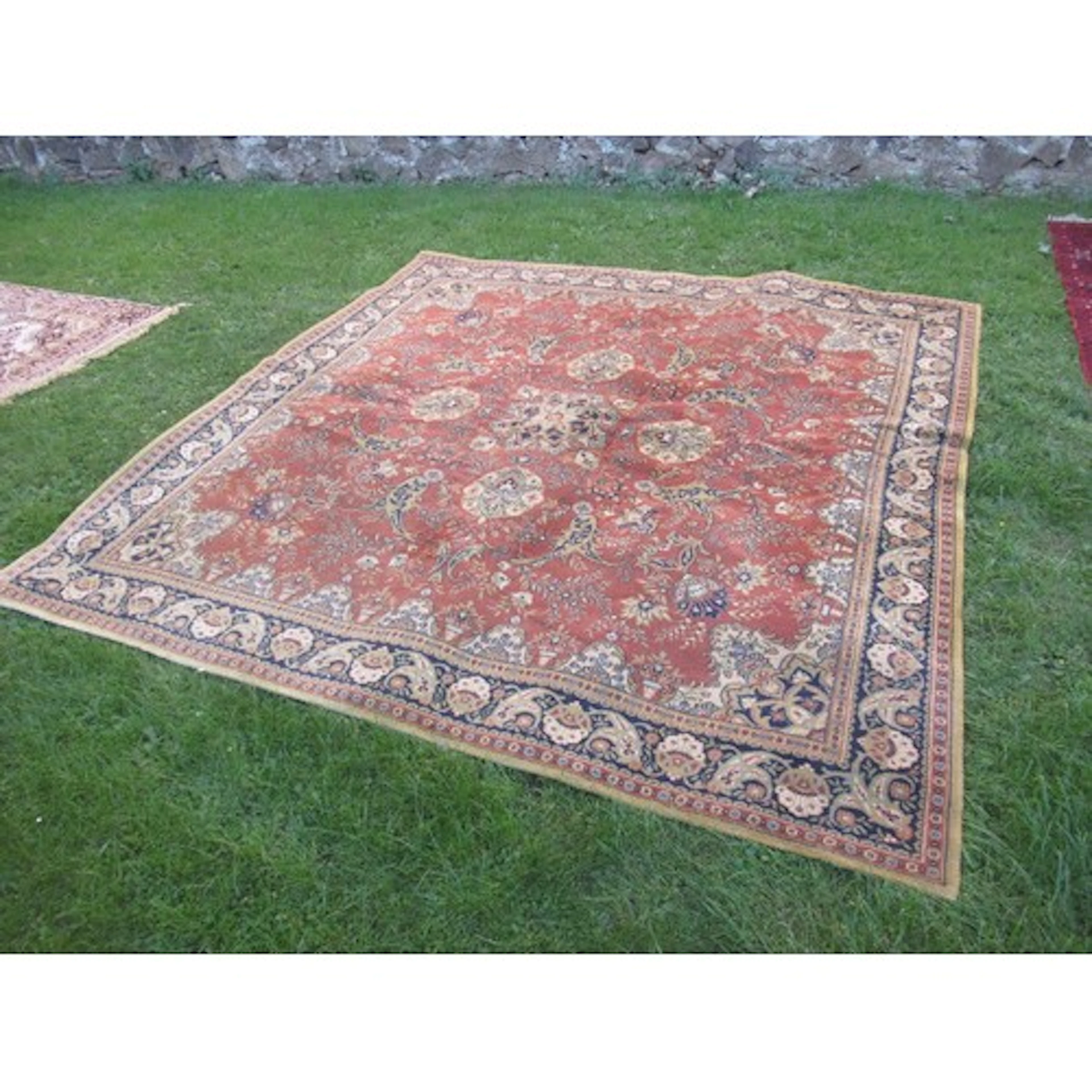 An eastern design square rug 100ins