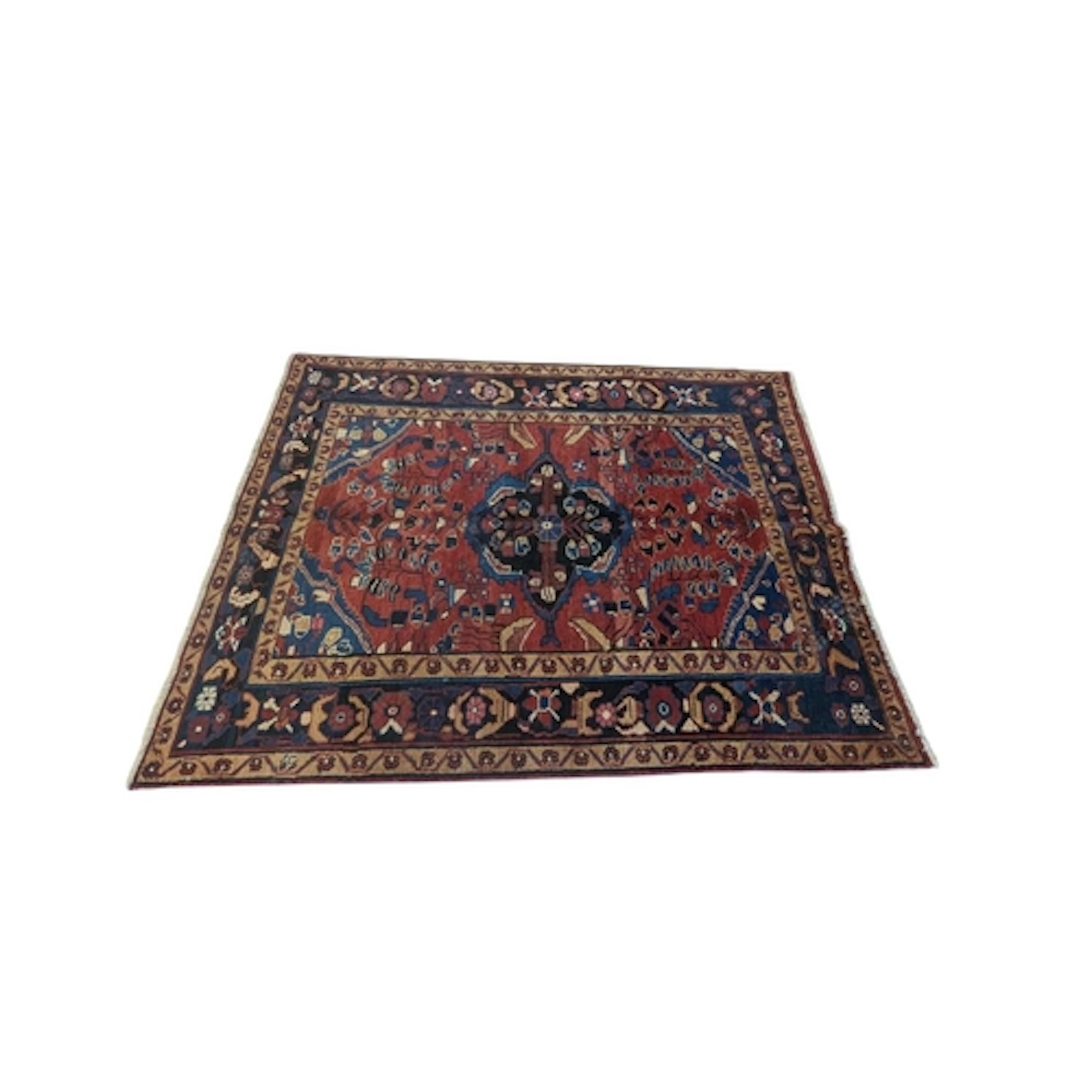 A vintage 20th century North West Persian Heriz carpet floor...