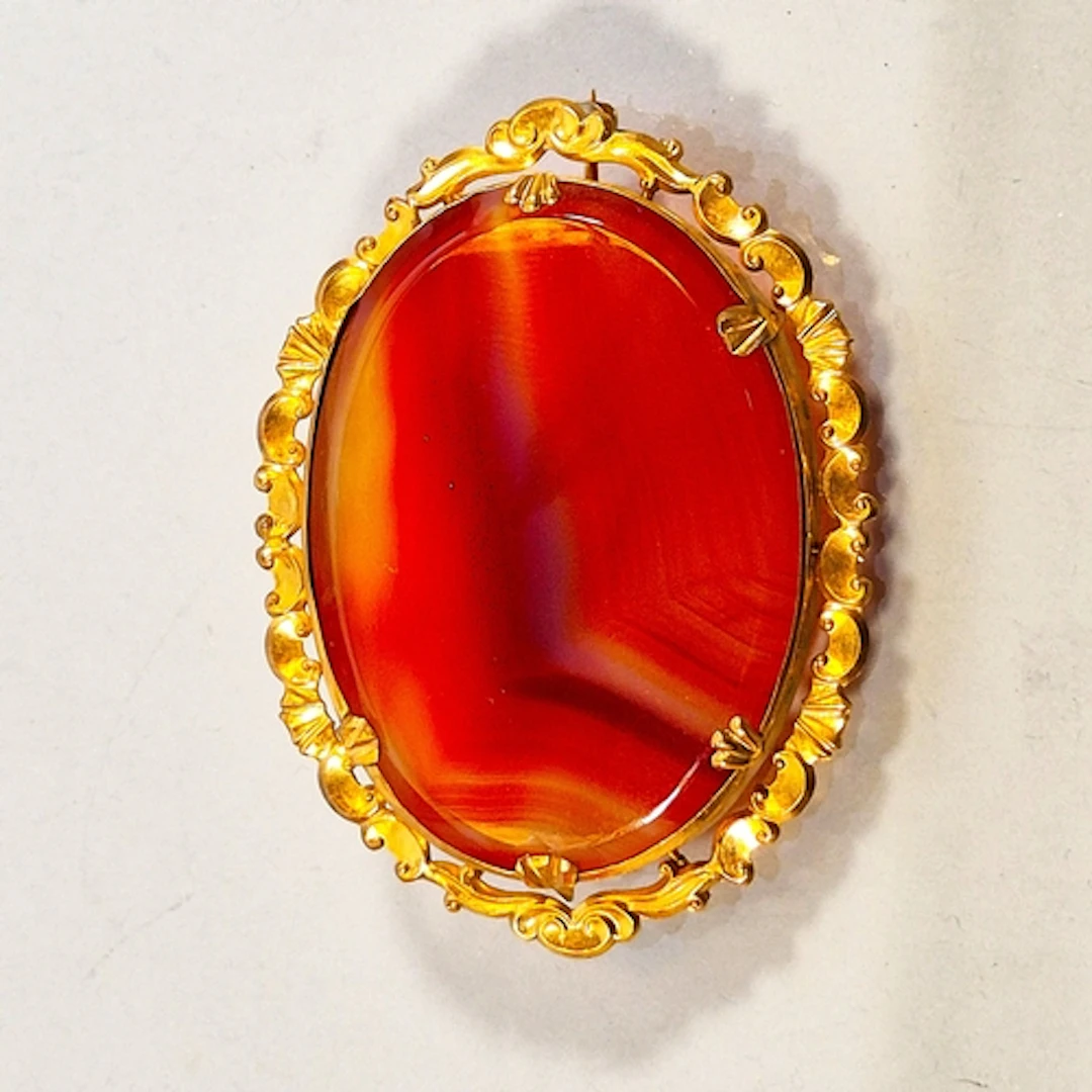 Victorian style agate brooch inset with a large vibrant oval...