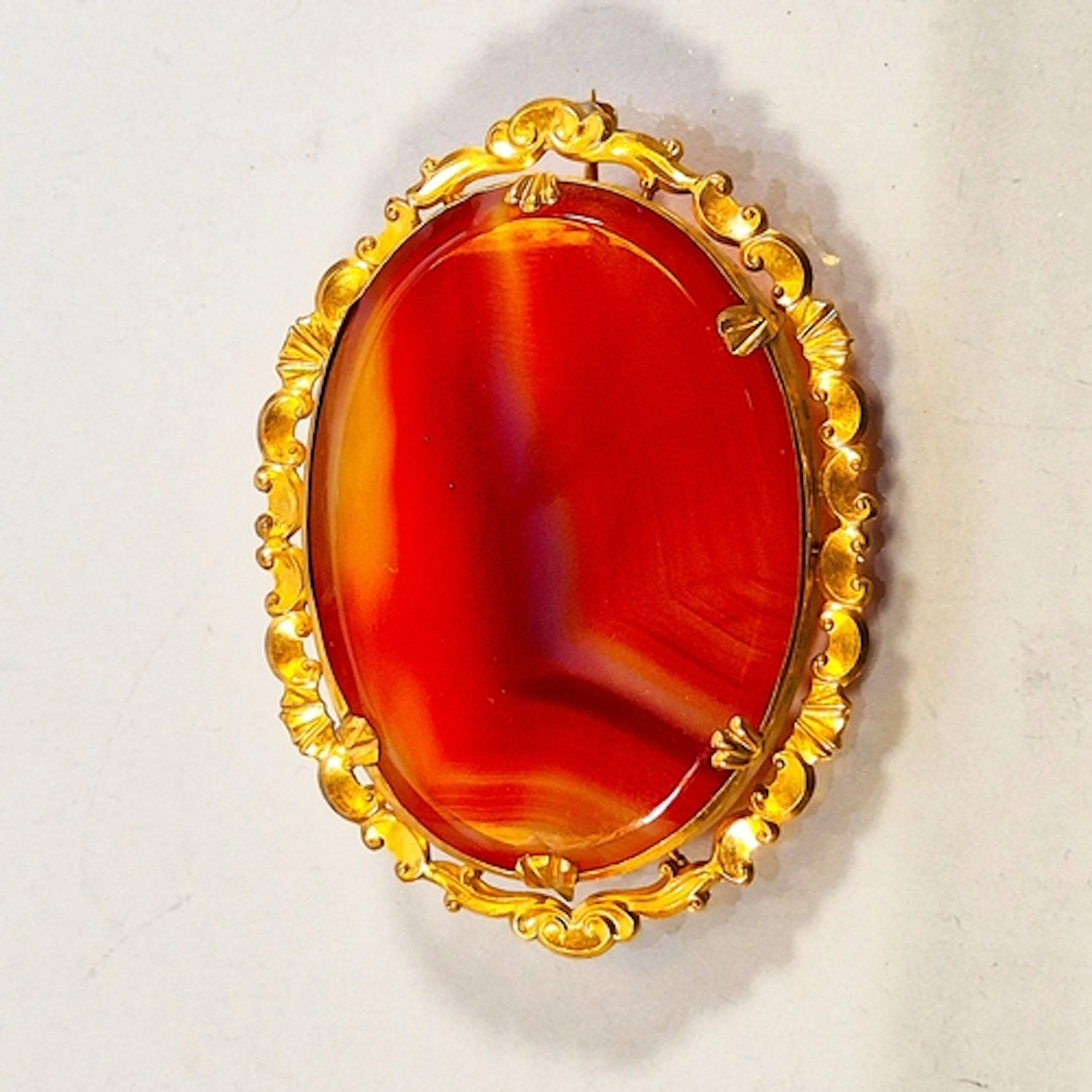 Victorian style agate brooch inset with a large vibrant oval...