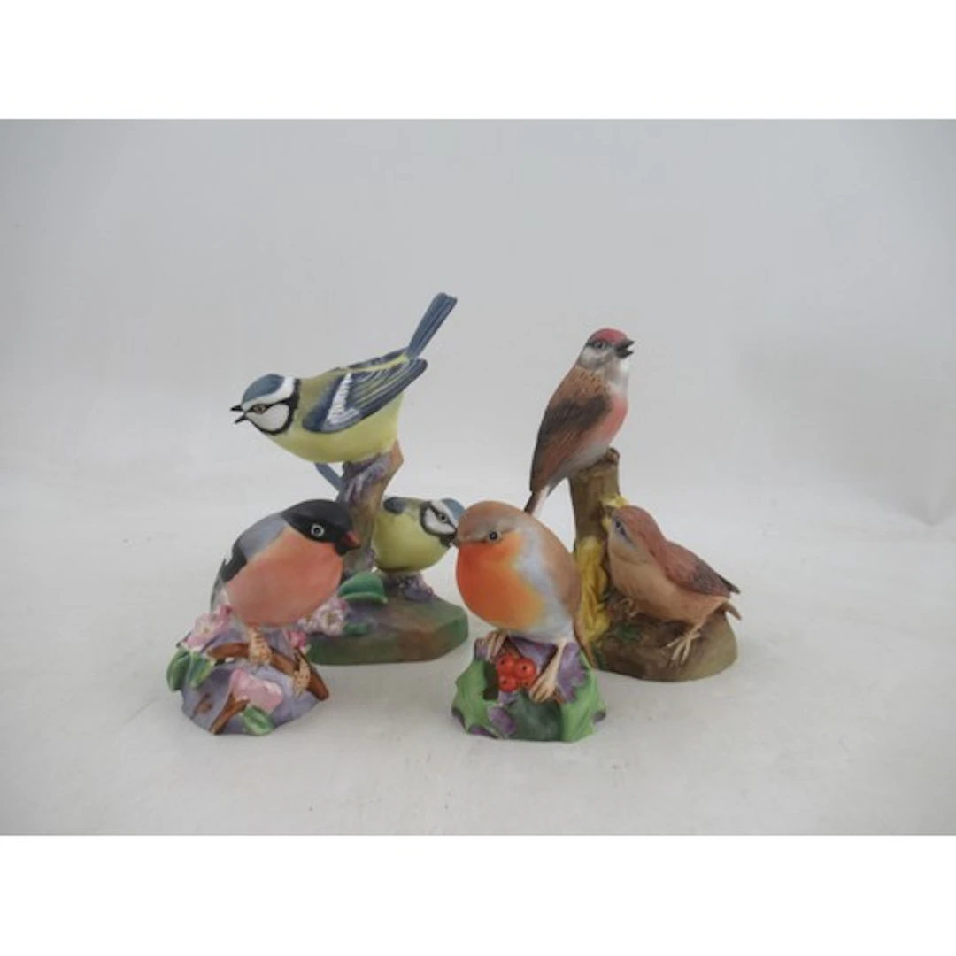 Four Royal Worcester bird models, double Blue Tits, double L...