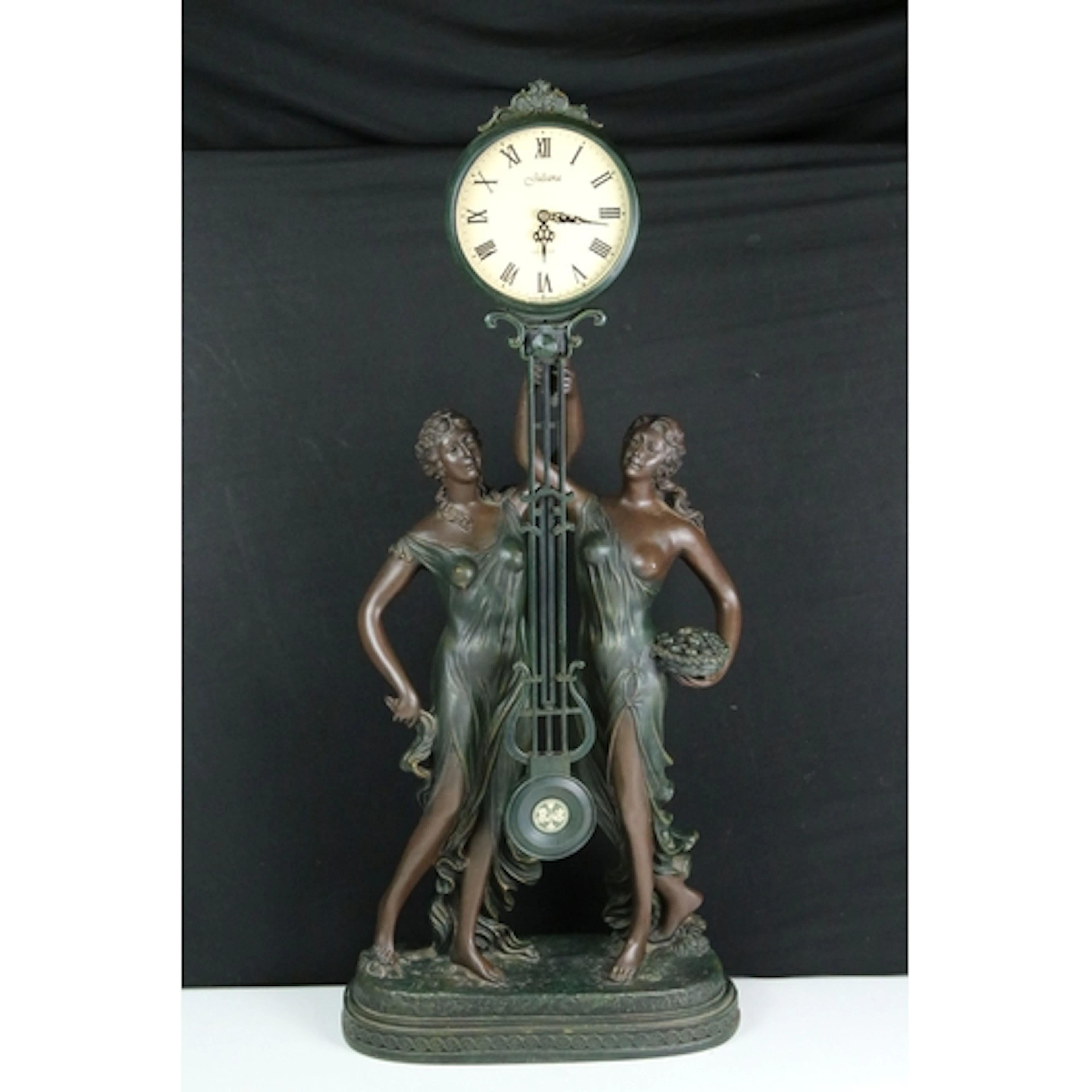 Juliana Art Nouveau style figural table clock having two bro...
