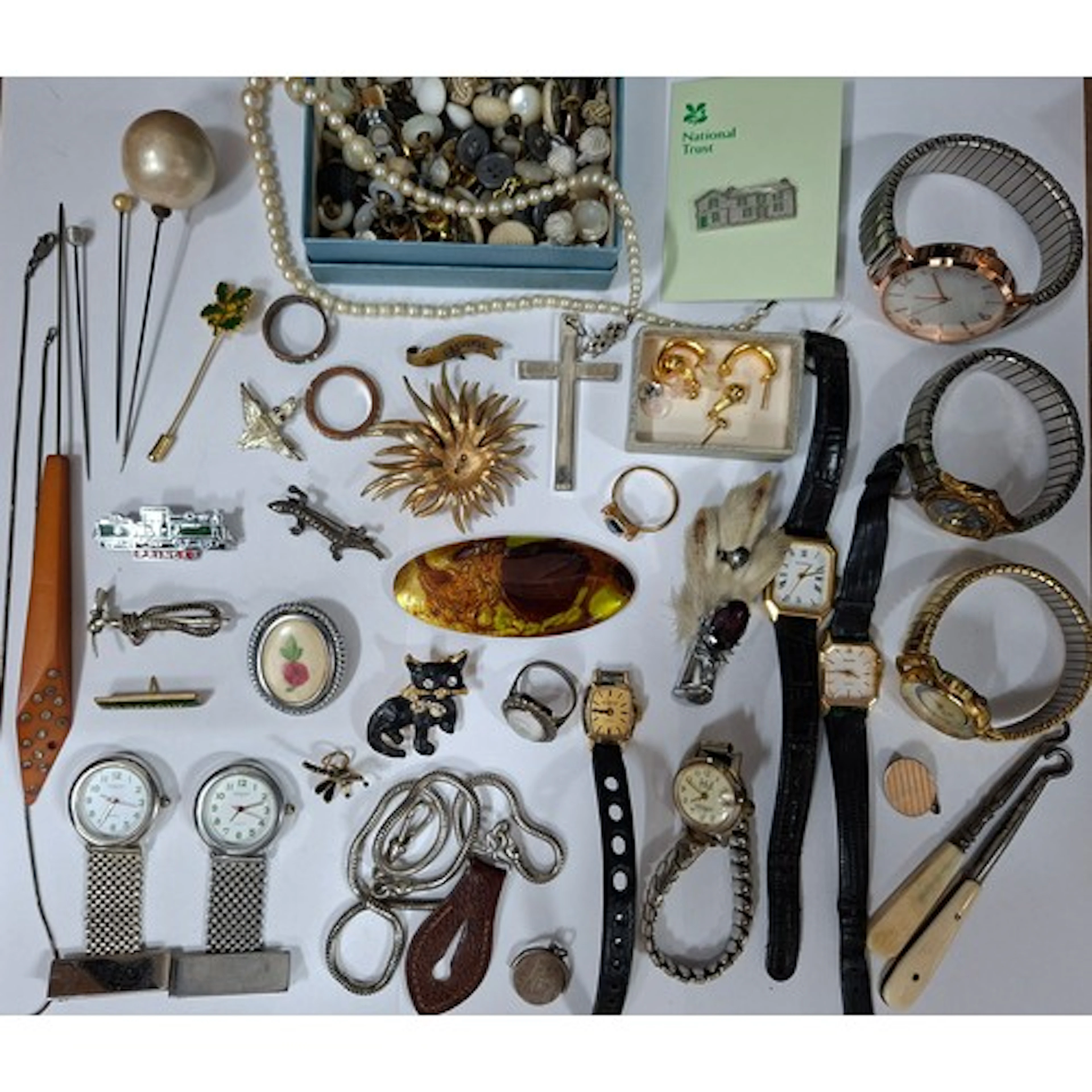 A 1960's/70's light brown jewellery box and contents to incl...