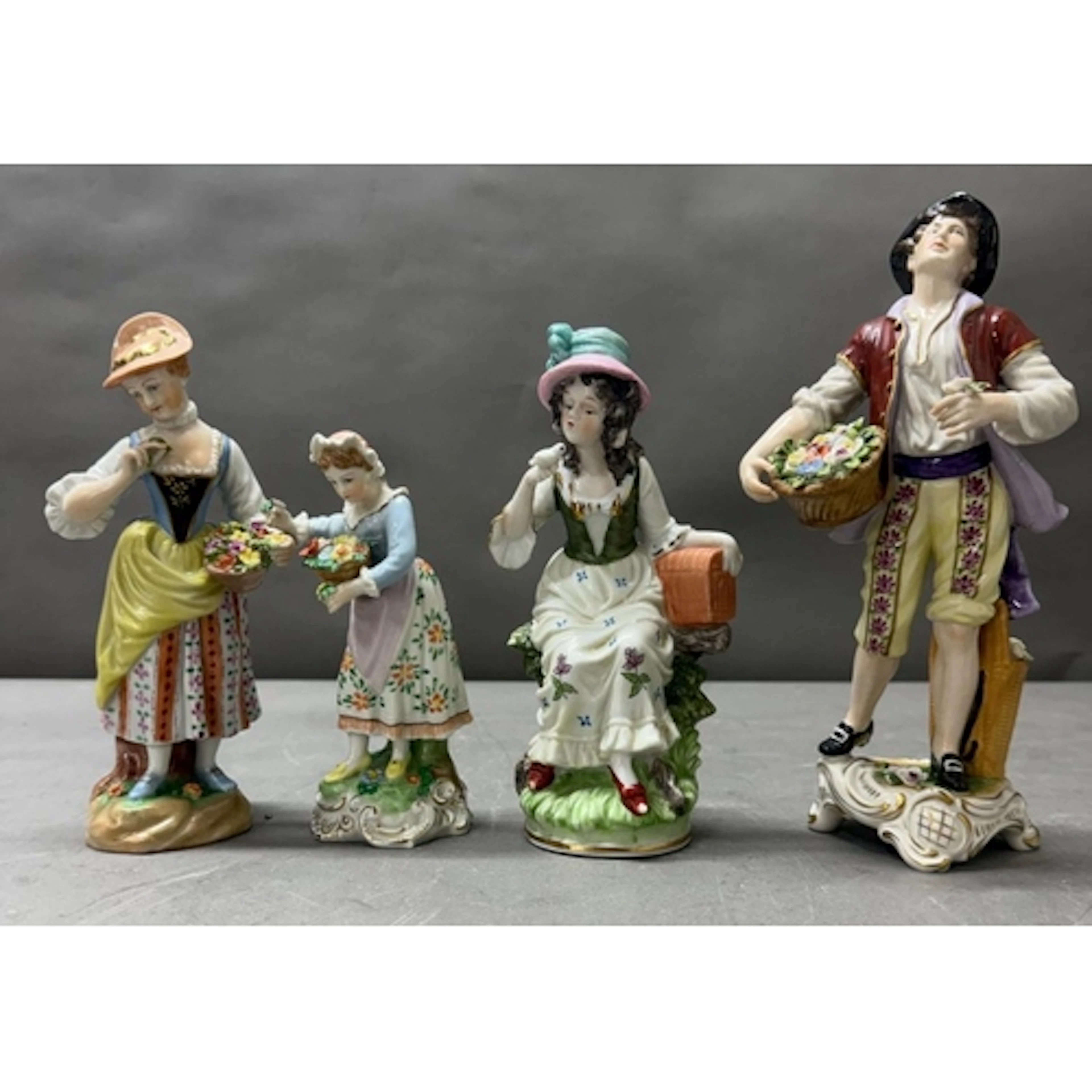 Four Dresden figurines, various makers, including Sitzendorf