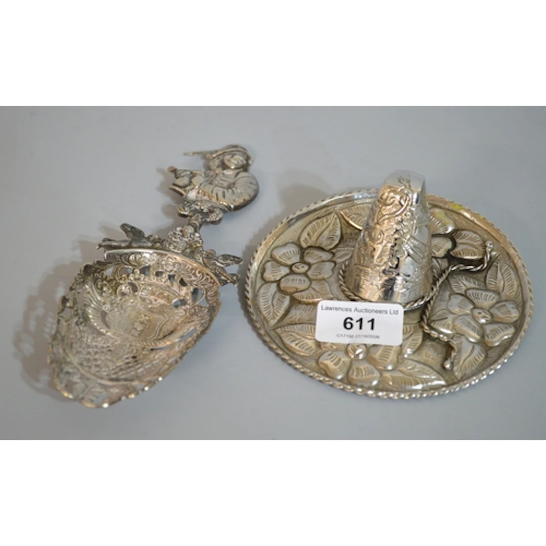 Birmingham silver sifter spoon, with figural finial, togethe...