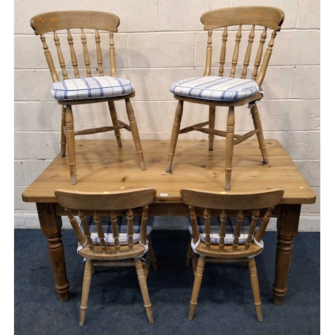 A PINE RECTANGULAR FARMHOUSE STYLE TABLE, raised on block an...