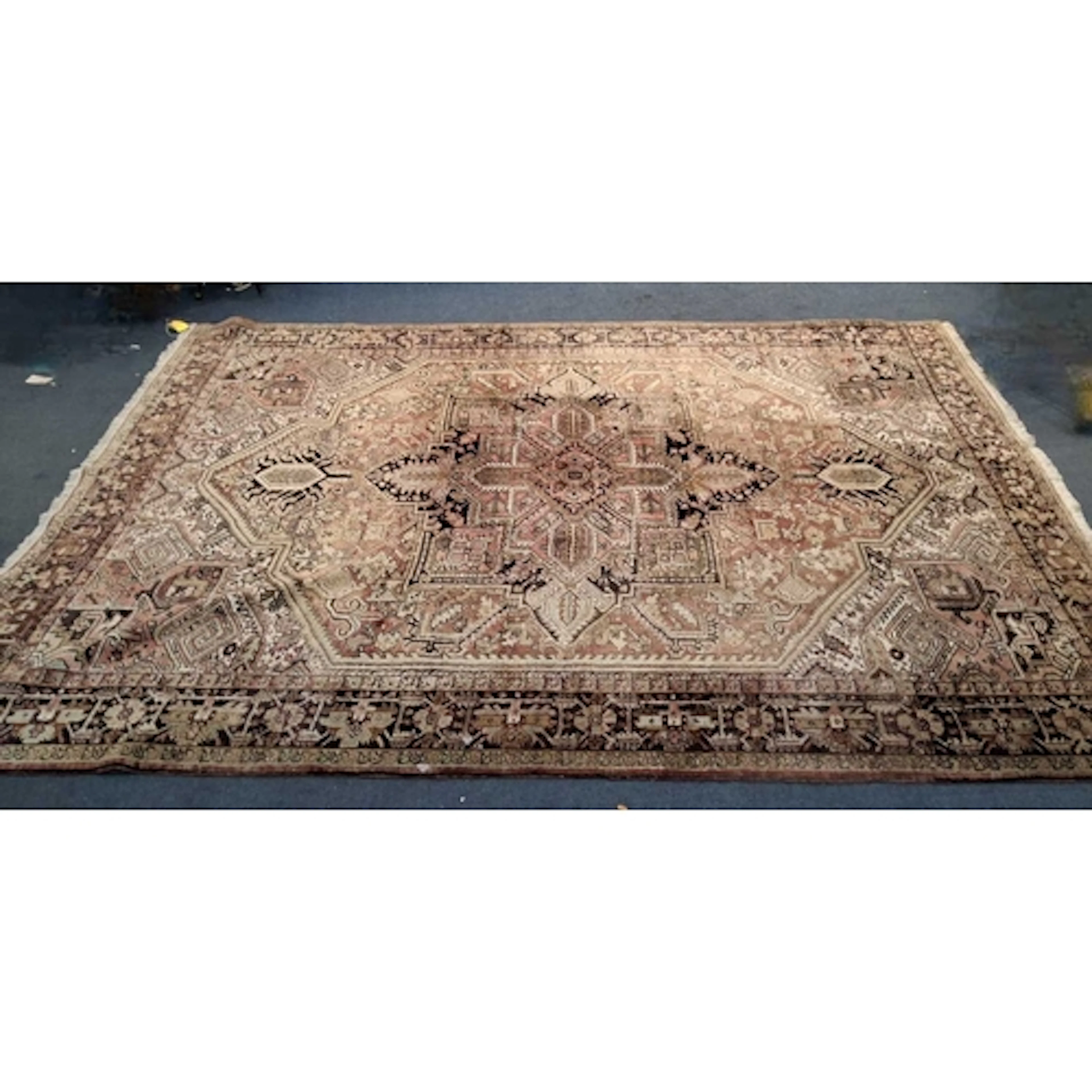 A LARGE PINK GROUND RECTANGULAR PERSIAN SERAPI RUG, with var...