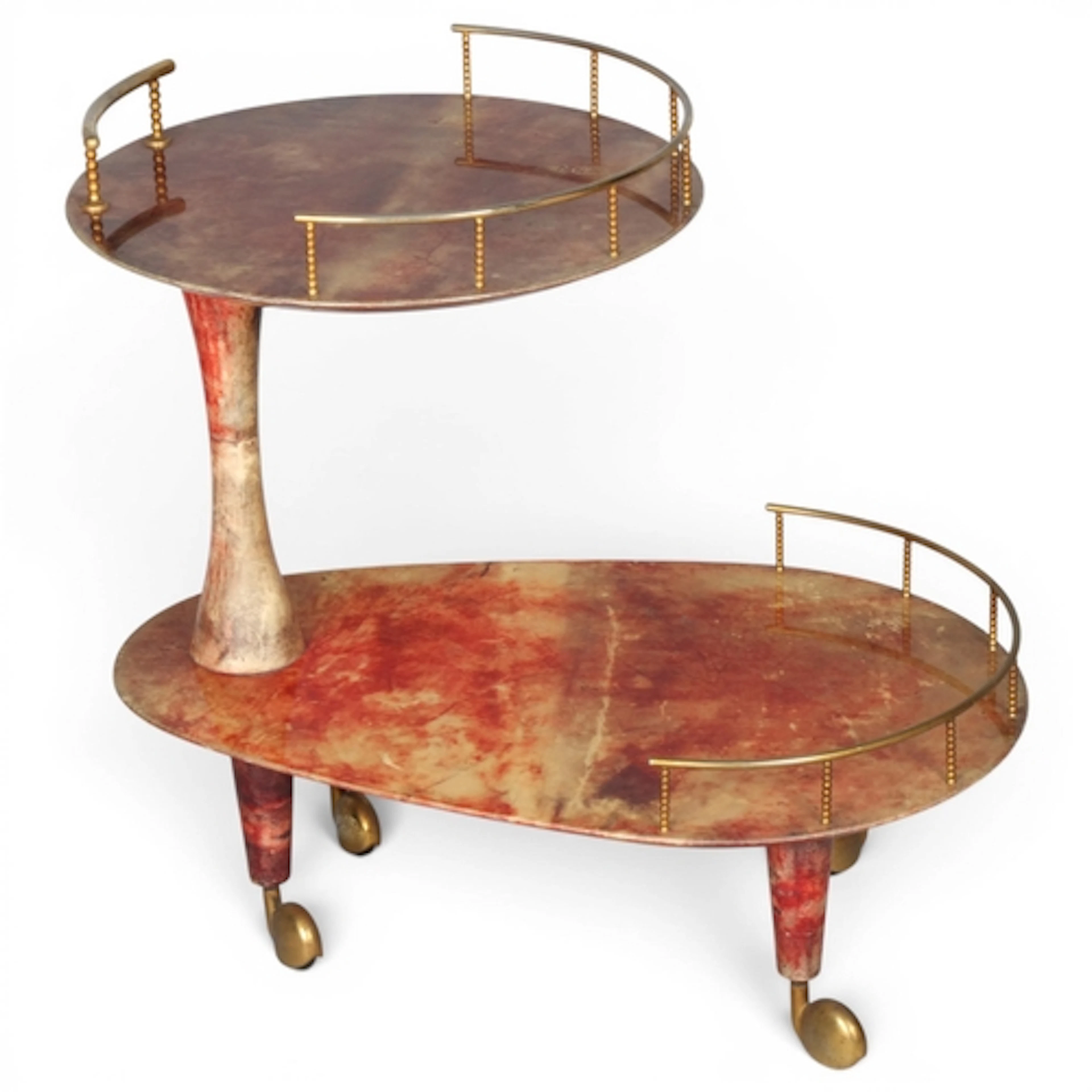 ALDO TURA, a mid-century drinks trolley, the lacquered goats...